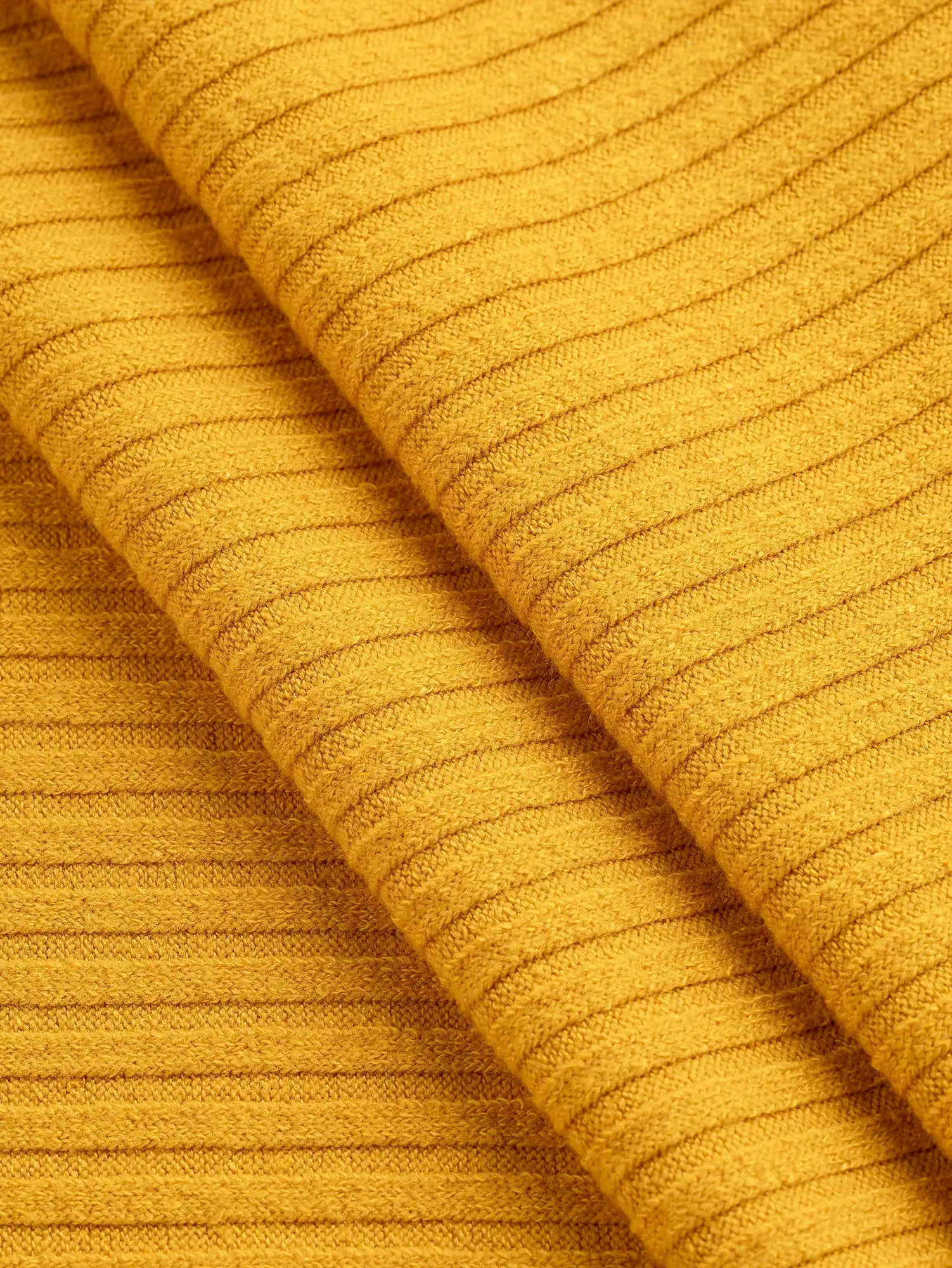 F-DEA209-Polyester-Cotton-Stretch-Rib-Knit-Deadstock-Marigold-Core-Fabrics-fold.webp