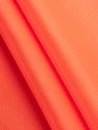 F-DEA099-Polyester-Lining-Deadstock-Bright-Orange-Core-Fabrics-fold.JPG