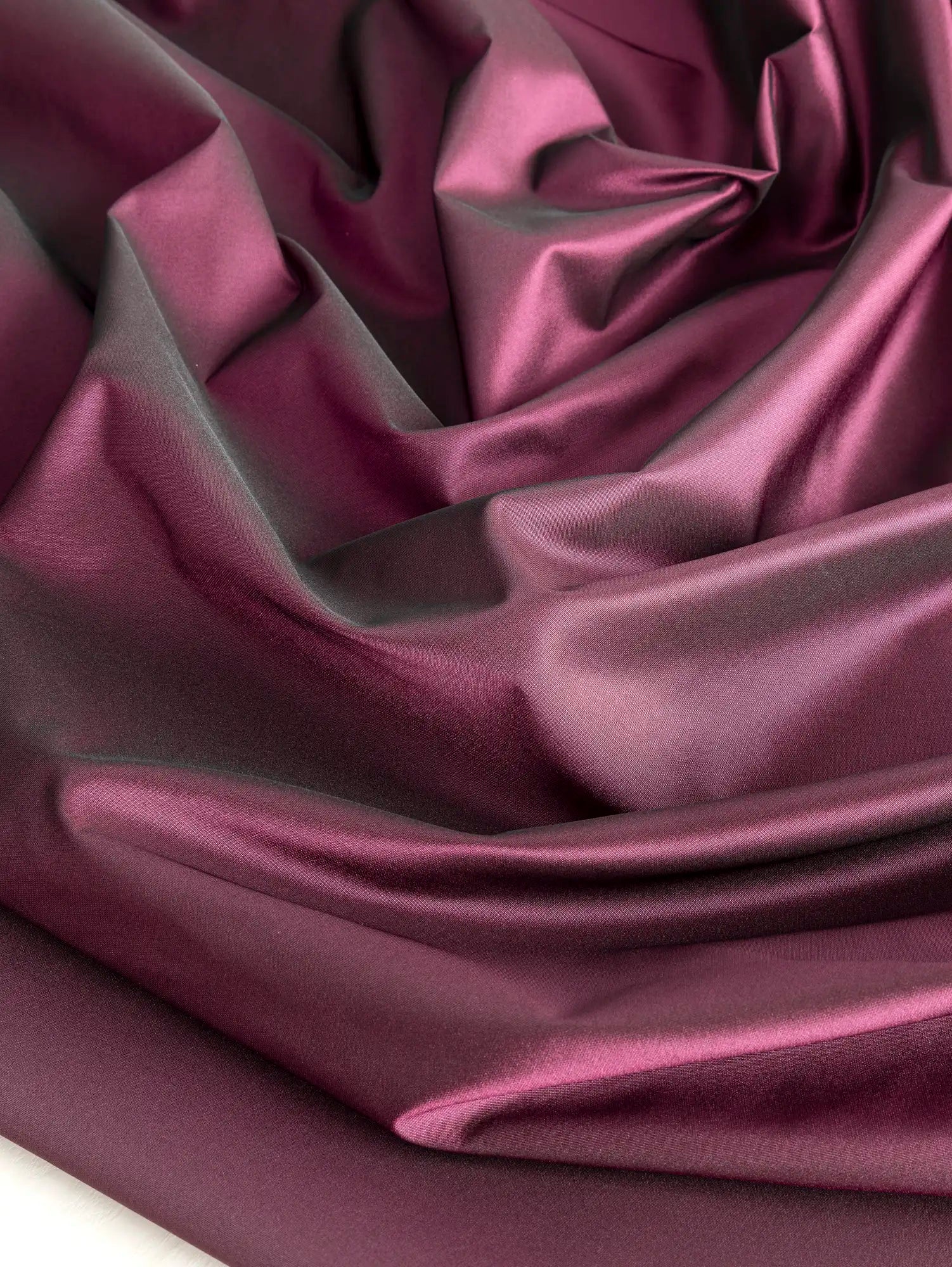 F-DEA200-Polyester-Taffeta-Deadstock-Aubergine-Core-Fabrics-scrunched.webp