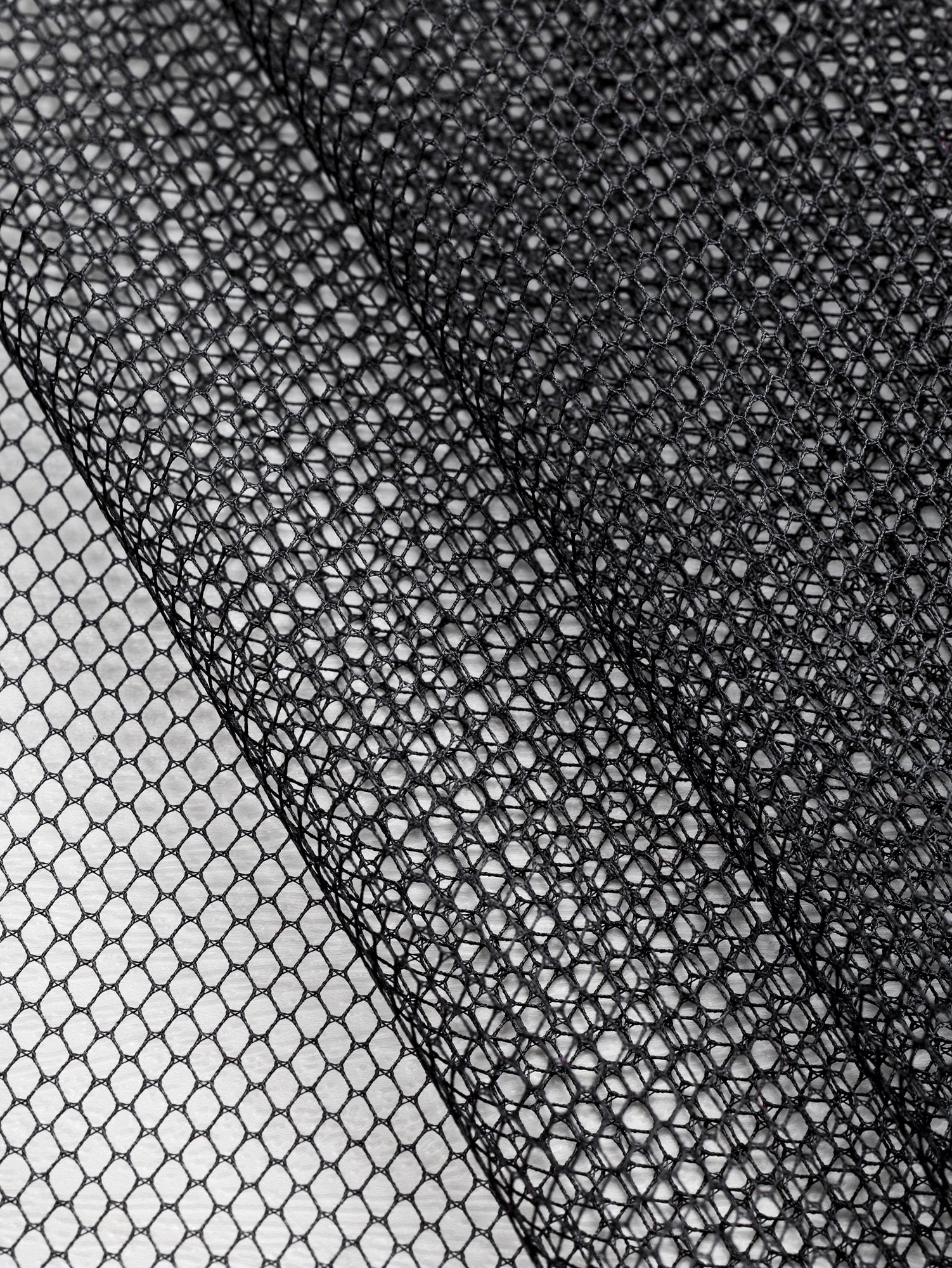 F-DEA109-Polyester-Tulle-Deadstock-Black-Core-Fabrics-fold.JPG