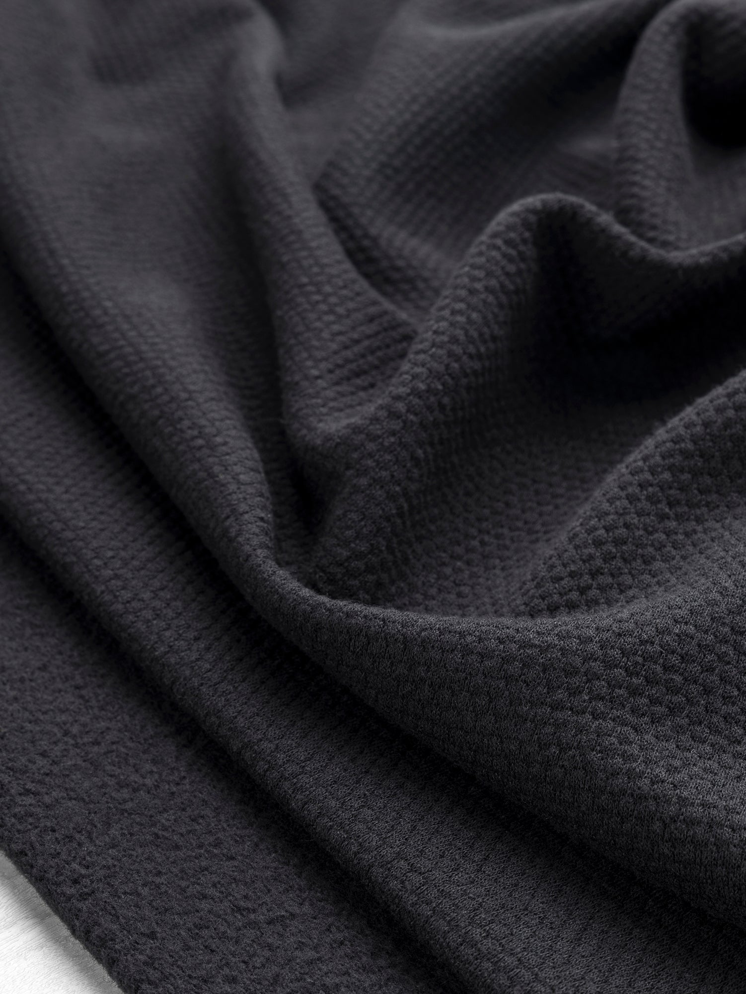 F-DEA097-001-Popcorn-Textured-Fleece-Deadstock-Black-Core-Fabrics-scrunched.JPG