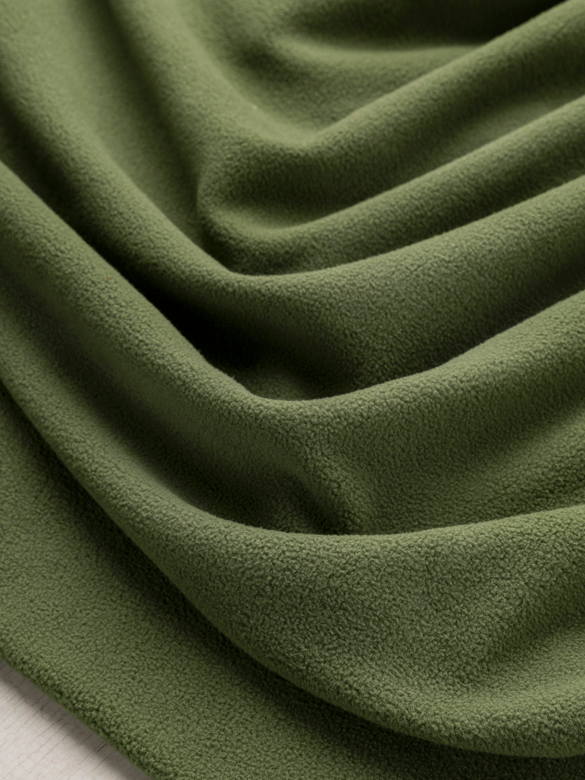 F-DEA253-004-RPET-Polar-Fleece-Deadstock-Basil-Core-Fabrics-scrunched.webp
