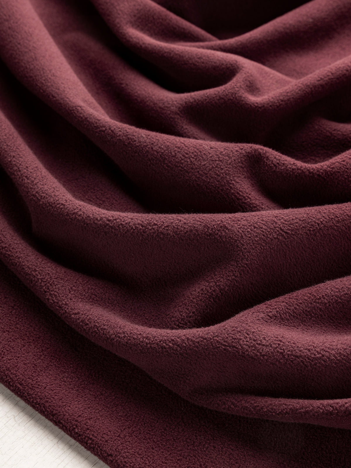 F-DEA253-002-RPET-Polar-Fleece-Deadstock-Bordeaux-Core-Fabrics-scrunched.webp