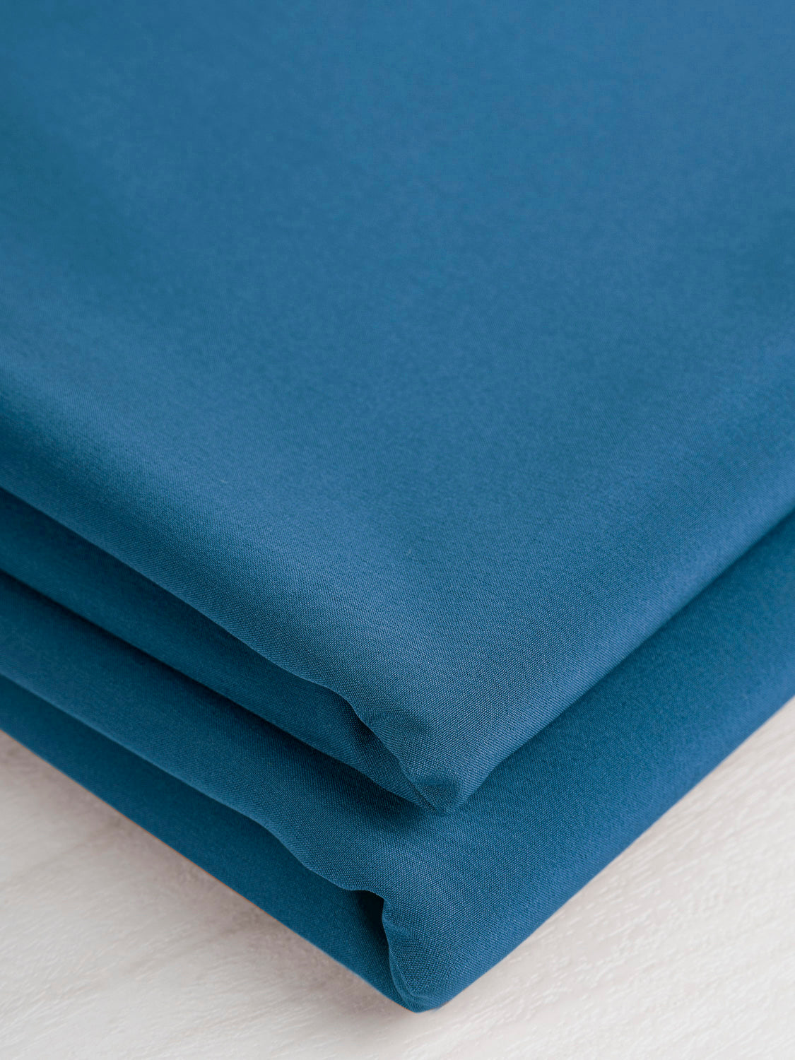 F-PES015-006-Recycled-Dintex-Meshback-Softshell-Teal-Core-Fabrics-fold