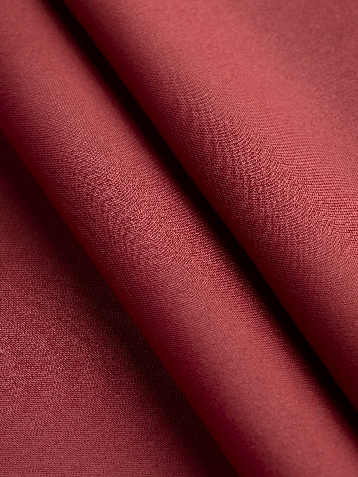 F-NYL027-006-Recycled-Nylon-Spandex-Performance-and-Swim Knit-Garnet-Core-Fabrics-fold.webp