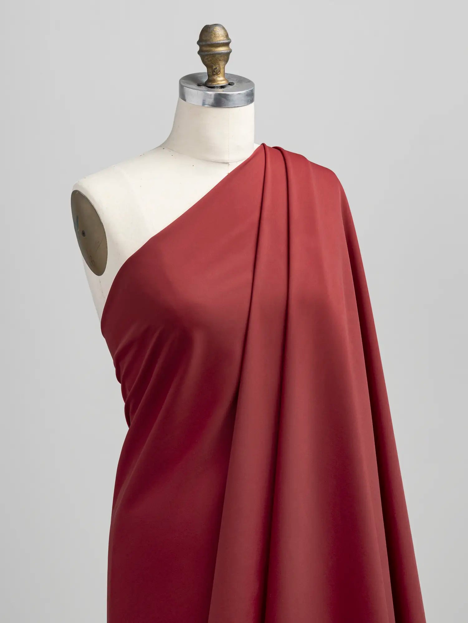 F-NYL027-006-Recycled-Nylon-Spandex-Performance-and-Swim Knit-Garnet-Core-Fabrics-draped.webp