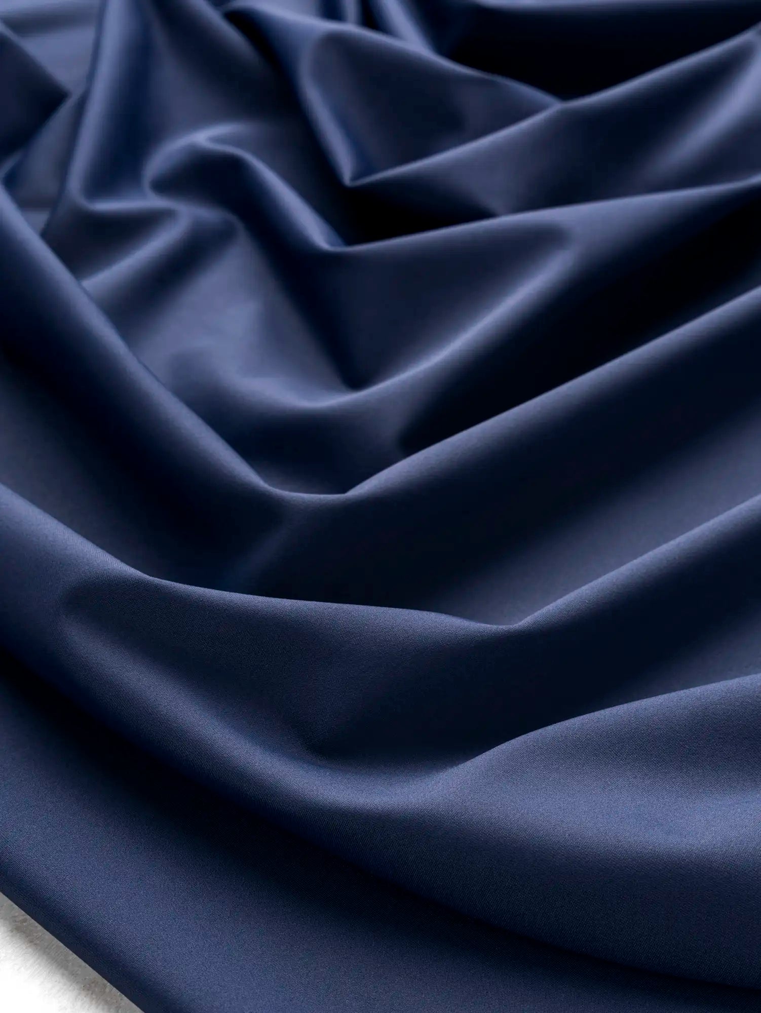 F-NYL027-002-Recycled-Nylon-Spandex-Performance-and-Swim-Knit-Indigo-Core-Fabrics-scrunched.webp