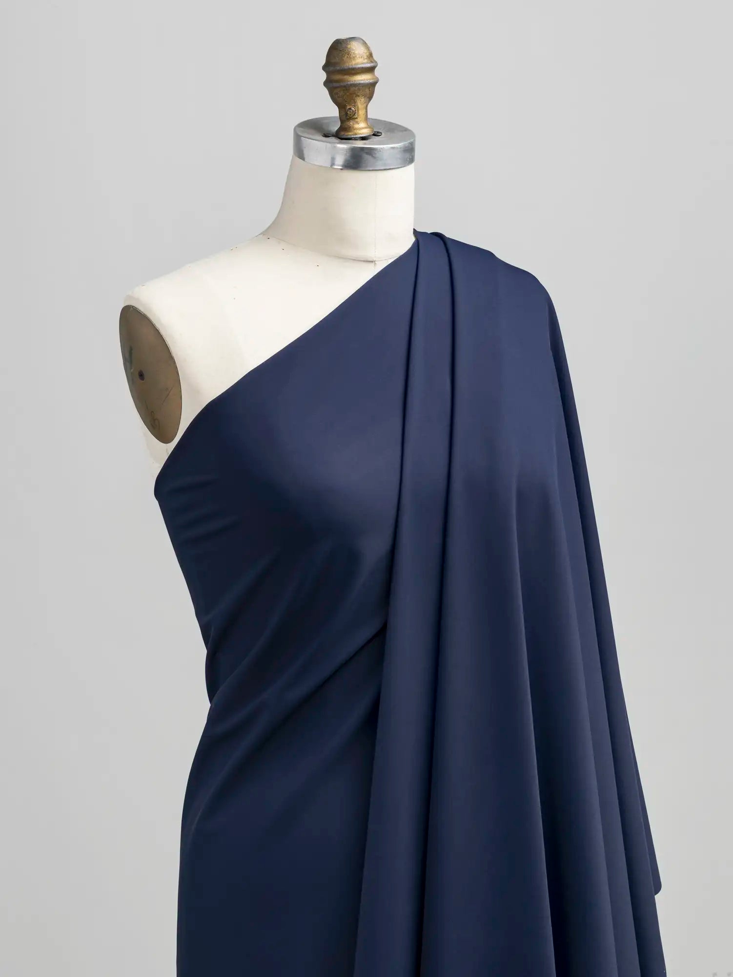 F-NYL027-002-Recycled-Nylon-Spandex-Performance-and-Swim-Knit-Indigo-Core-Fabrics-draped.webp