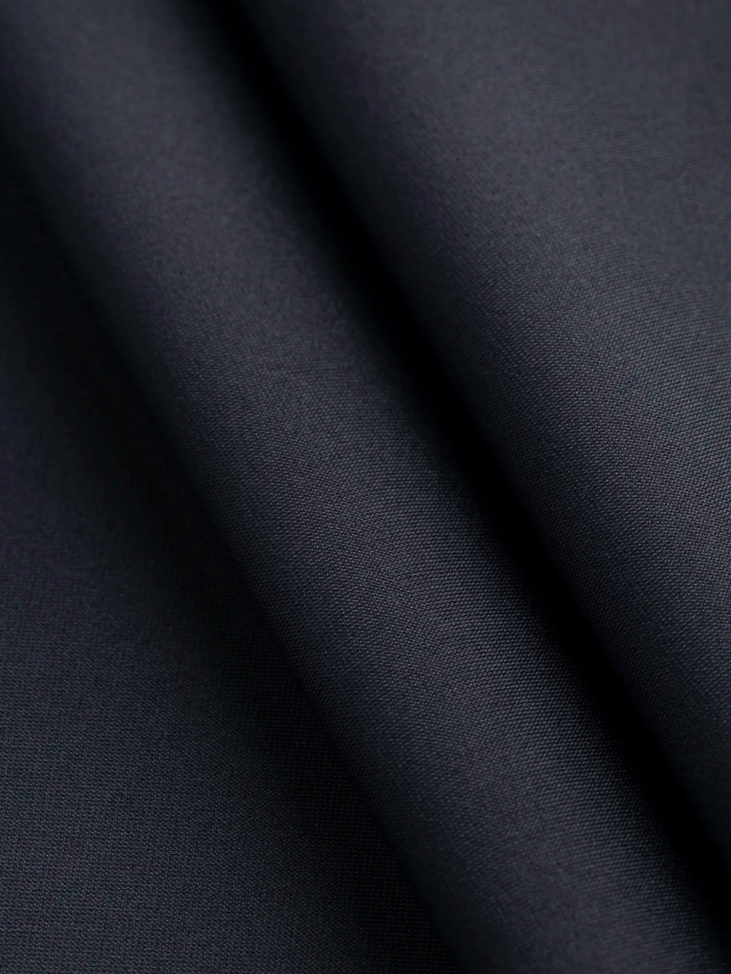 F-NYL027-001-Recycled-Nylon-Spandex-Performance-and-Swim Knit-Onyx-Core-Fabrics-fold.webp