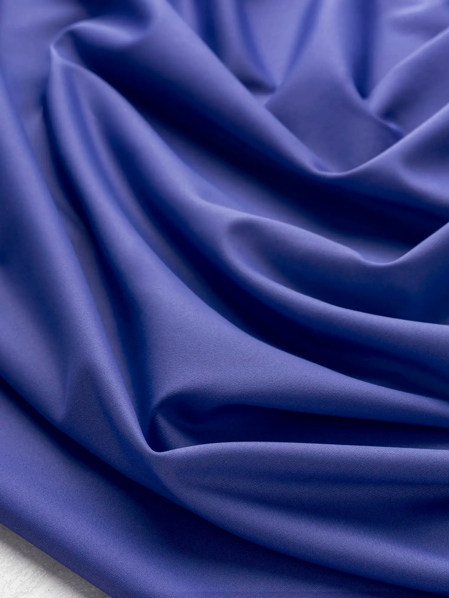 F-NYL027-003-Recycled-Nylon-Spandex-Performance-and-Swim-Knit-Periwinkle-Core-Fabrics-scrunched.webp
