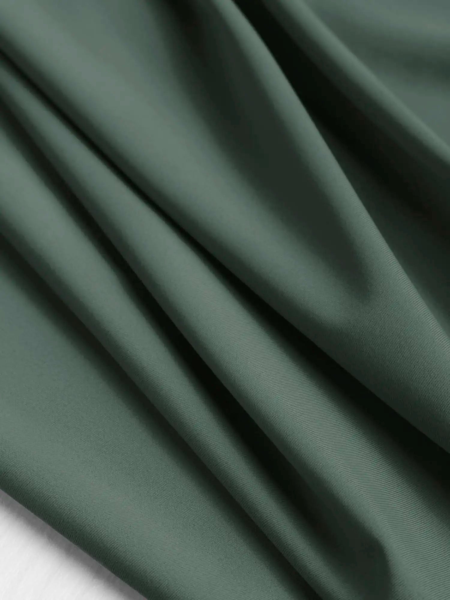F-NYL001-021-Recycled-Nylon-Spandex-Swimwear-Fabric-Olive-Core-Fabrics-scrunched.webp