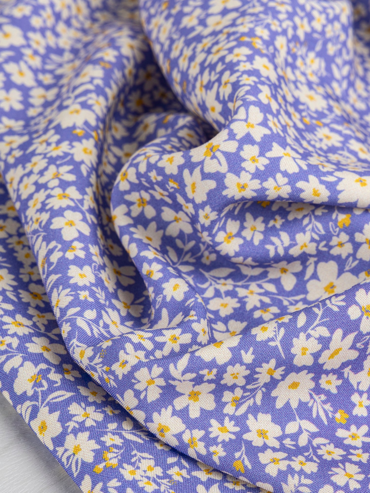 F-VIS239-Reverie-Ditzy-Floral-Print-Ecovero-Viscose-Periwinkle-Cream-and-Yellow-Core-Fabrics-scrunched.JPG