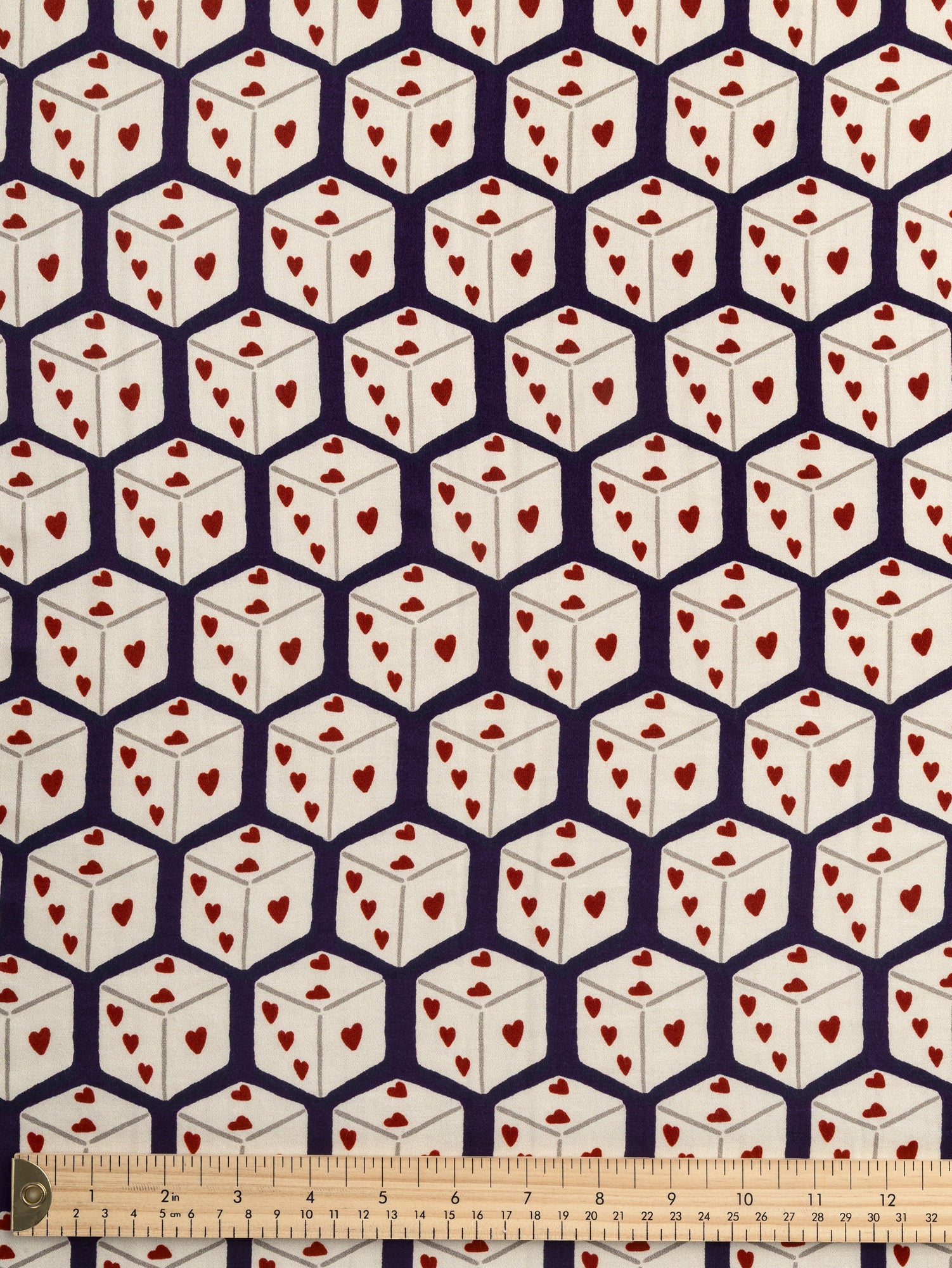 F-VIS275—Roll-The-Dice-Print-Viscose-Silk-Aubergine-Cream-Red-Core-Fabrics-ruler.JPG