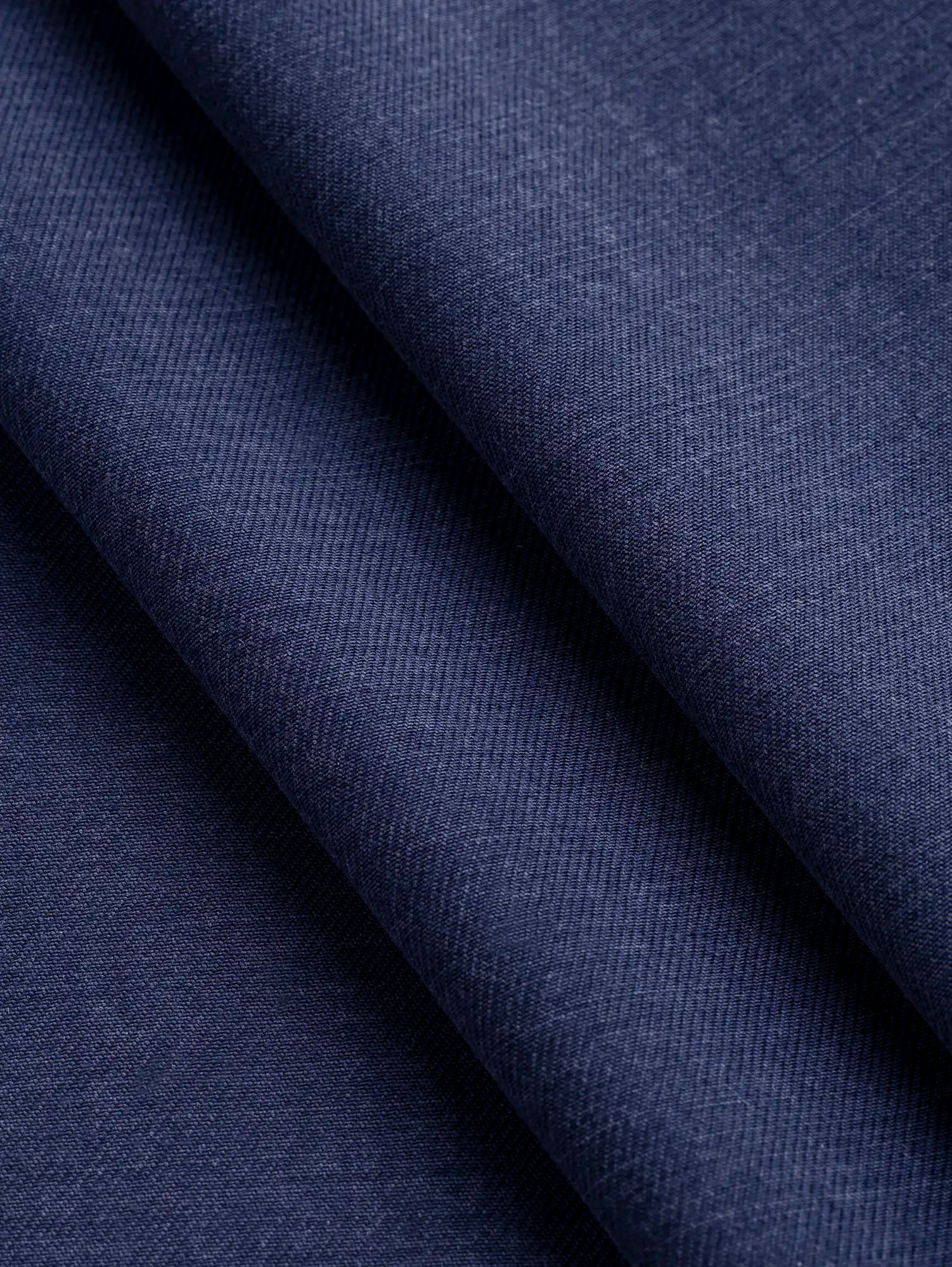 F-DEA213-Sandwashed-Lyocell-Twill-Deadstock-Indigo-Core-Fabrics-fold.webp