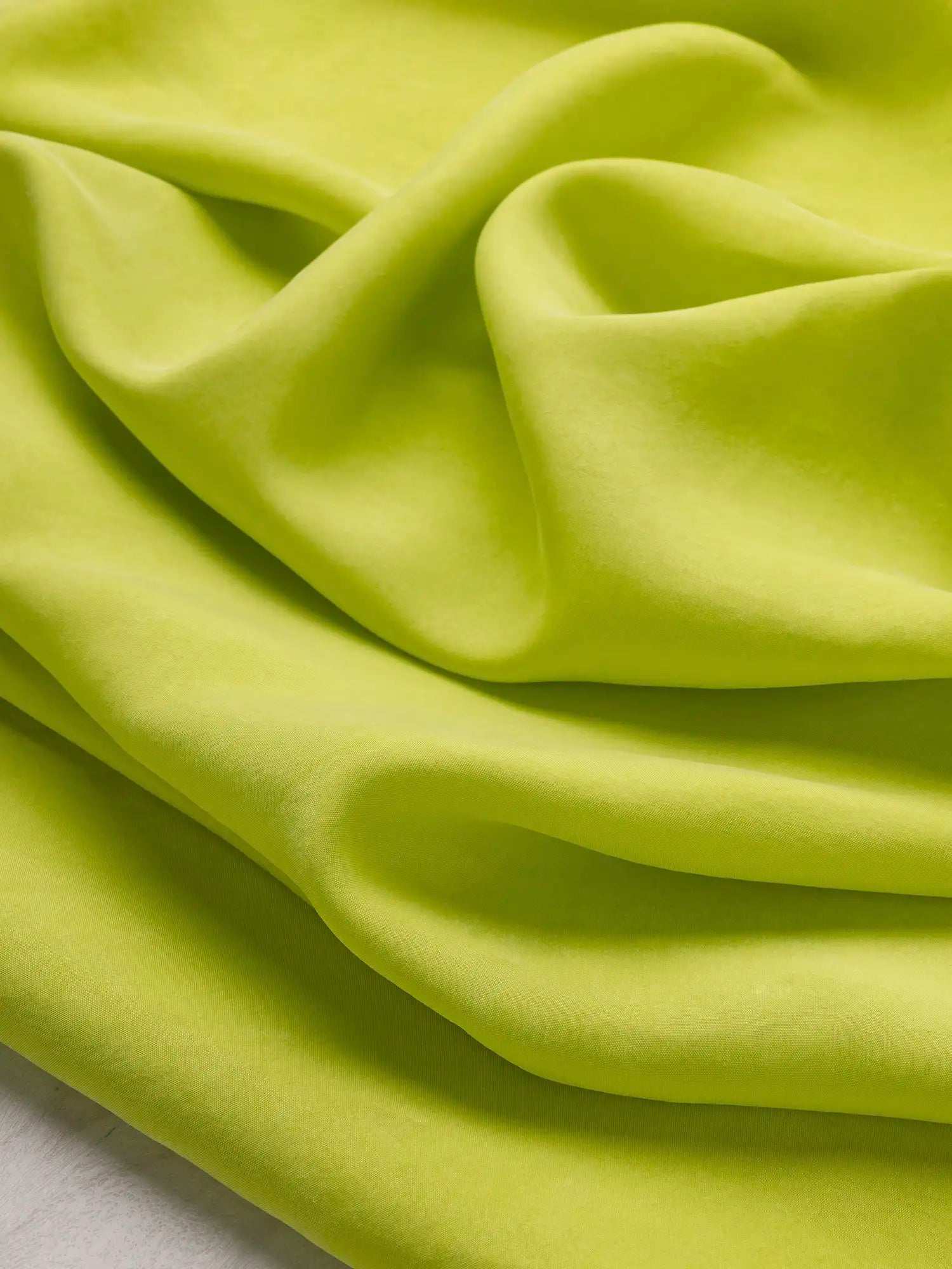 F-TEN018-006-Sandwashed-Tencel-Lyocell-Viscose-Chartreuse-Core-Fabrics-scrunched.webp