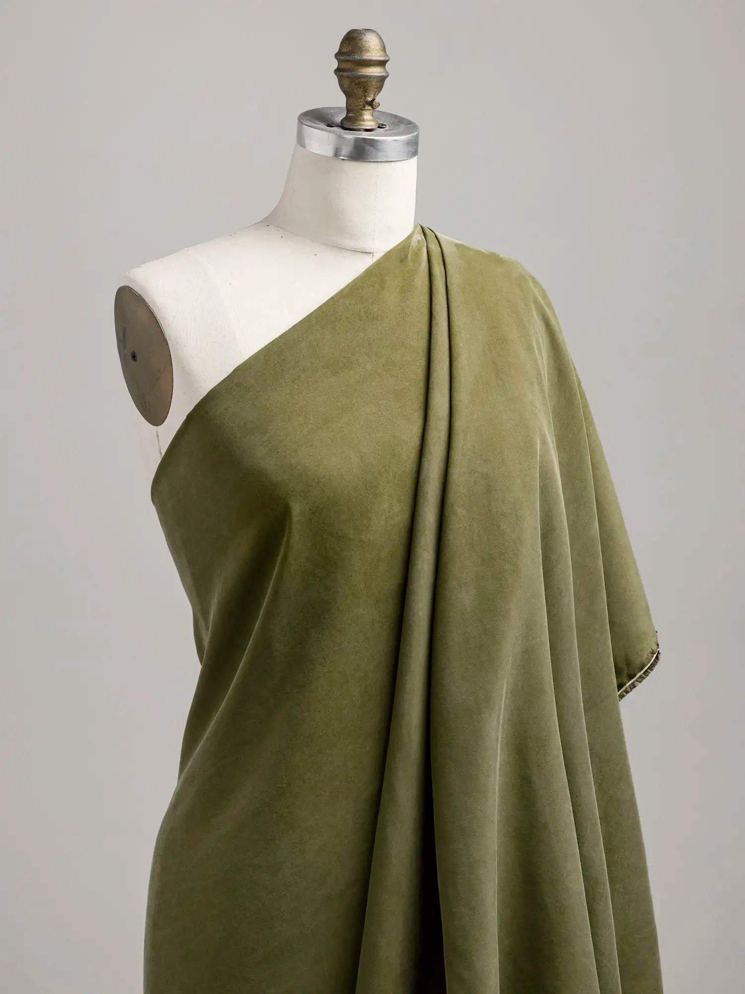 F-TEN018-005-Sandwashed-Tencel-Lyocell-Viscose-Olive-Core-Fabrics-draped.webp