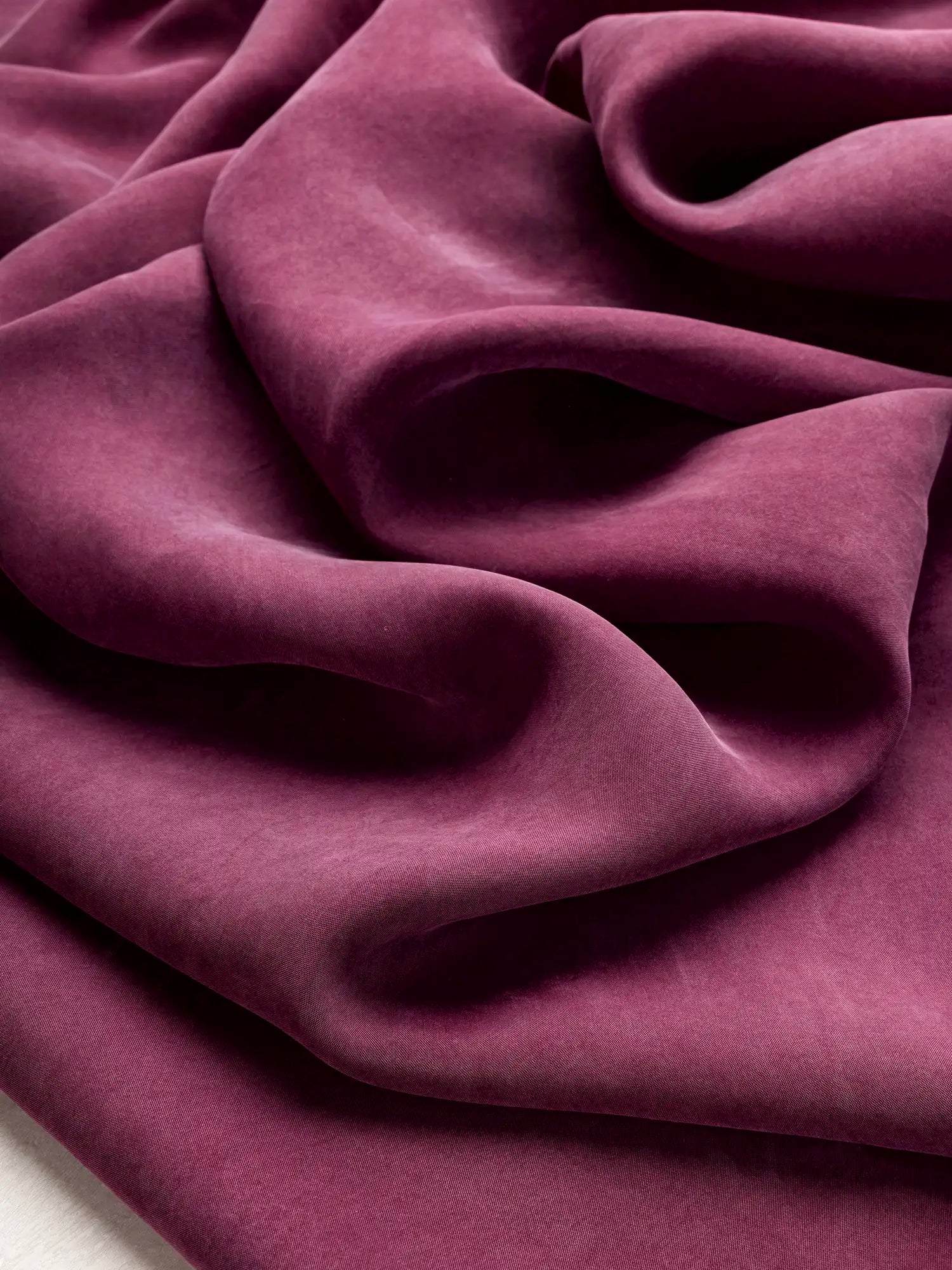 F-TEN018-003-Sandwashed-Tencel-Lyocell-Viscose-Raspberry-Core-Fabrics-scrunched.webp