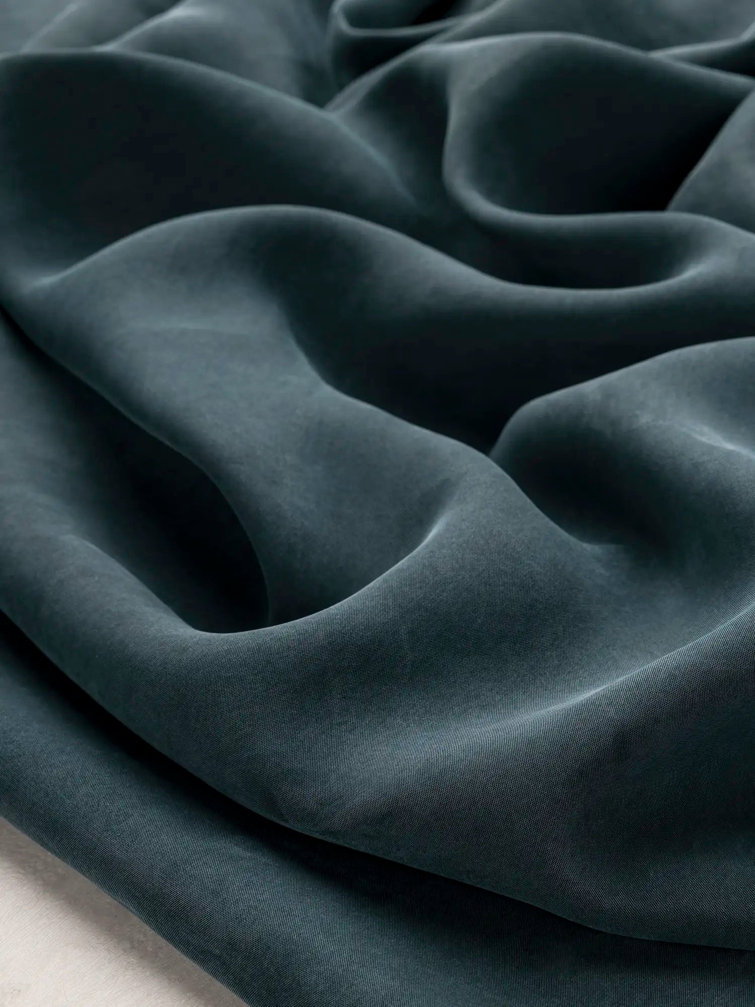 F-TEN018-002-Sandwashed-Tencel-Lyocell-Viscose-Teal-Core-Fabrics-scrunched.webp