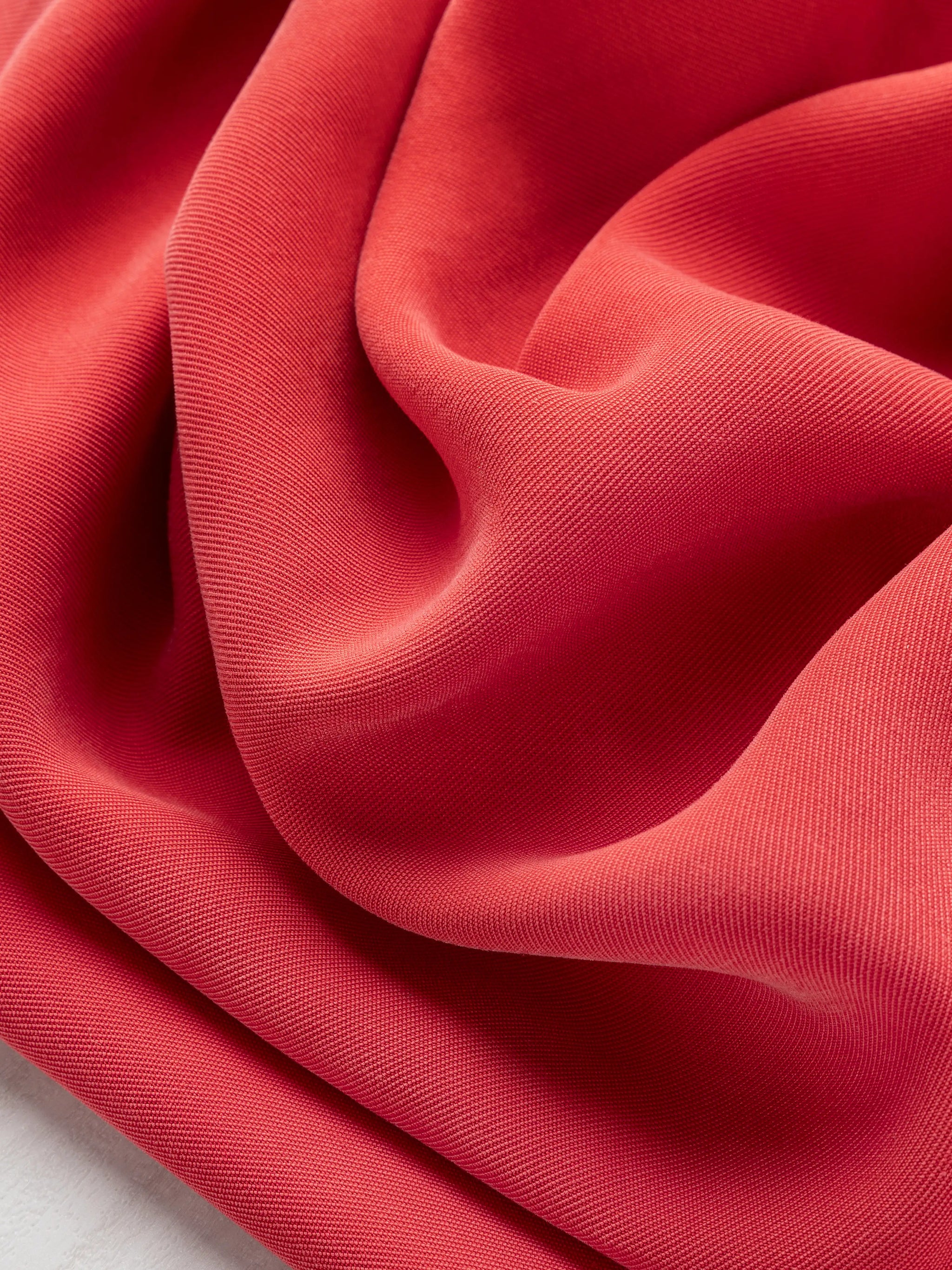 F-DEA144-Sandwashed-Viscose-Twill-Deadstock-Valentine-Red-Core-Fabrics-scrunched.webp