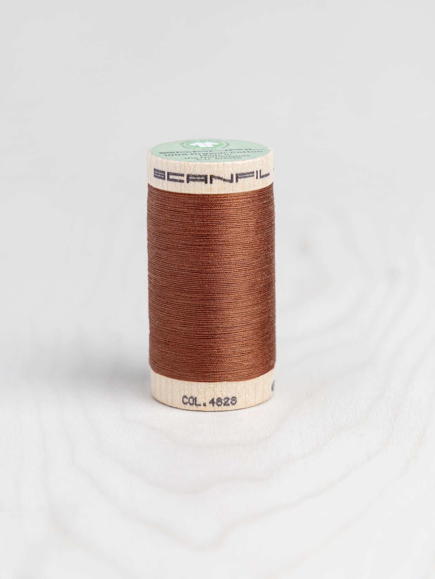 T-COT002-4828-Scanfil-Organic-Cotton-50wt-Thread-500-yard-Baked-Clay-4828-Core-Fabrics