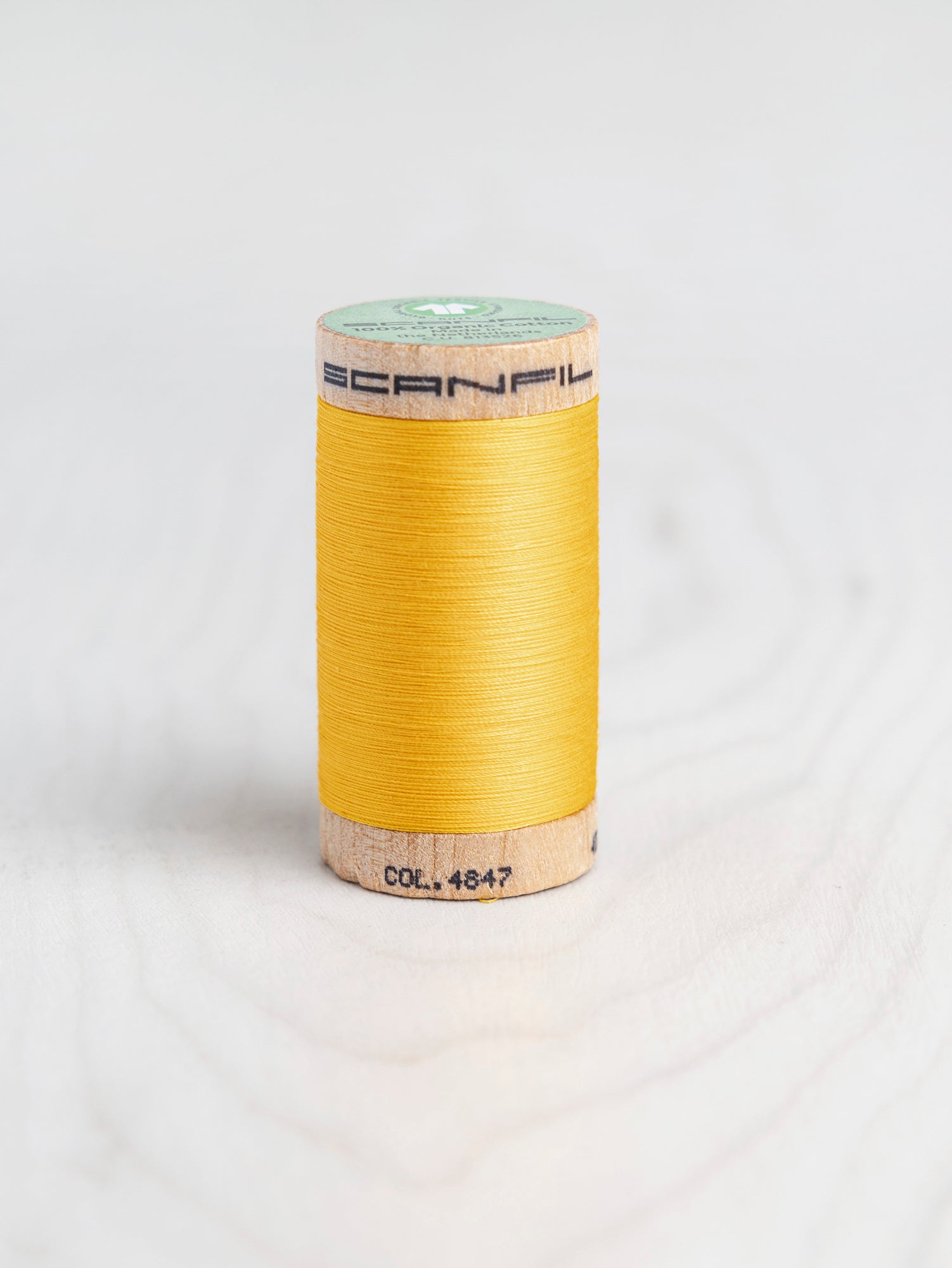 T-COT002-4847-Scanfil-Organic-Cotton-50wt-Thread-500-yard-Banana-4847-Core-Fabrics
