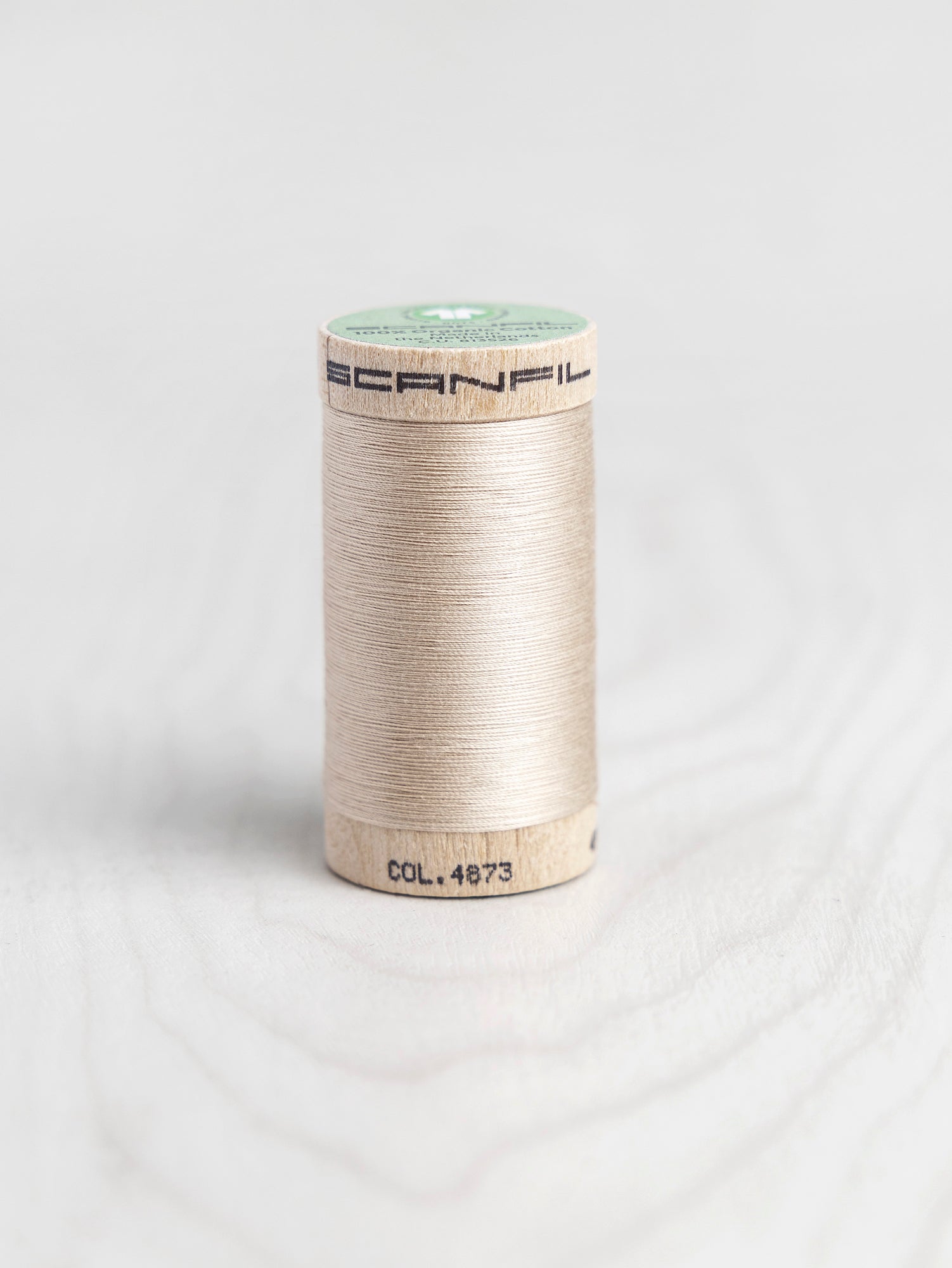 T-COT002-4873-Scanfil-Organic-Cotton-50wt-Thread-500-yard-Ivory-Cream-4873-Core-Fabrics