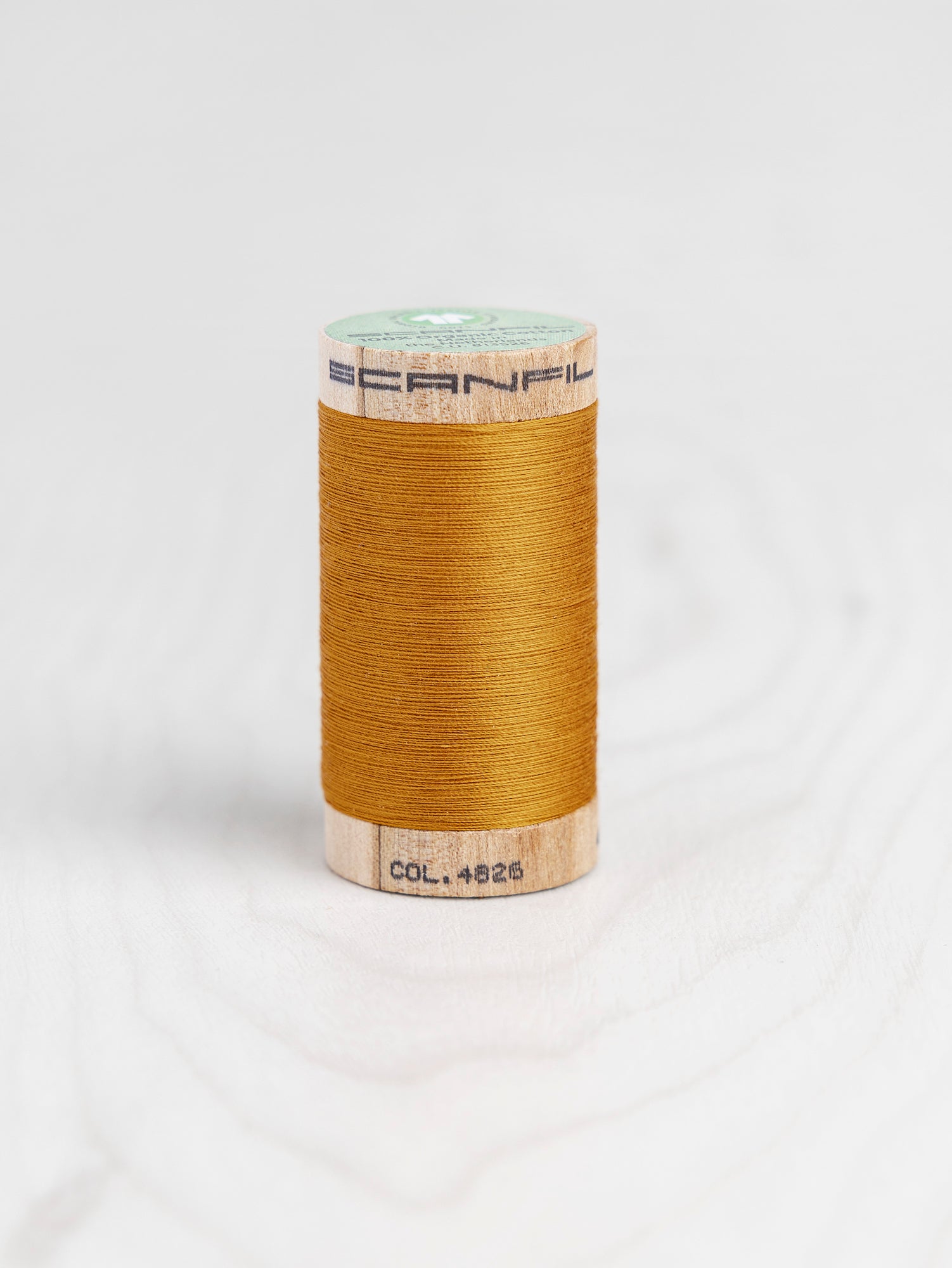 T-COT002-4826-Scanfil-Organic-Cotton-50wt-Thread-500-yard -Sunflower-4826-Core-Fabrics