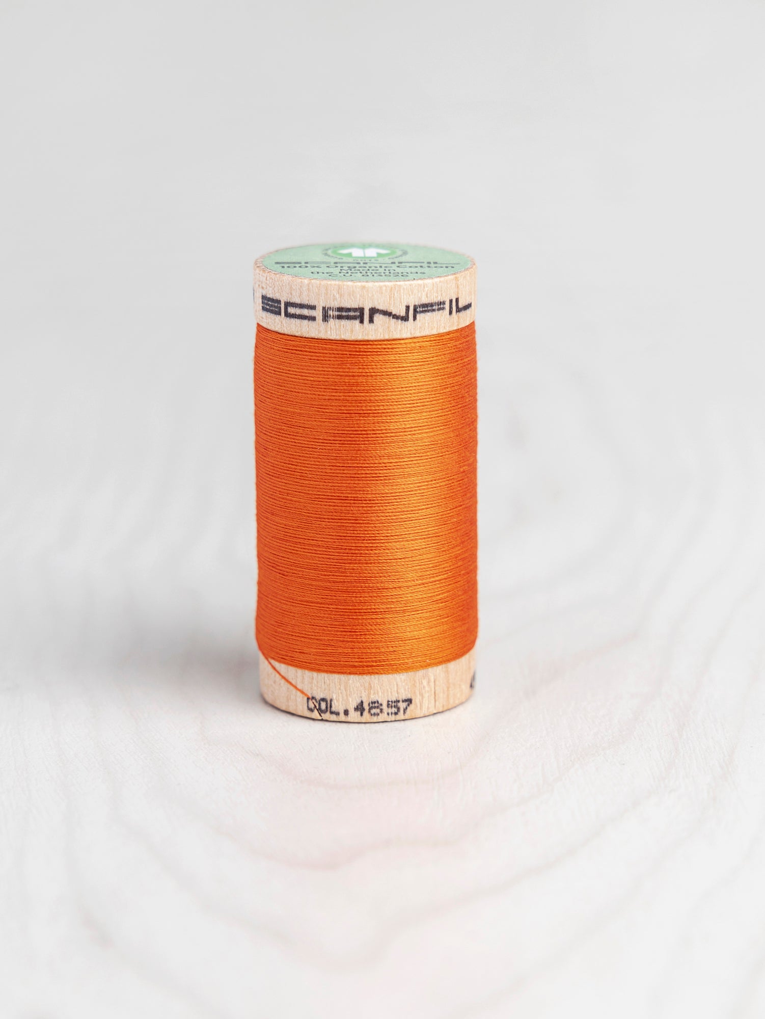 T-COT002-4857-Scanfil-Organic-Cotton-50wt-Thread-500-yard-Tangelo-4857-Core-Fabrics
