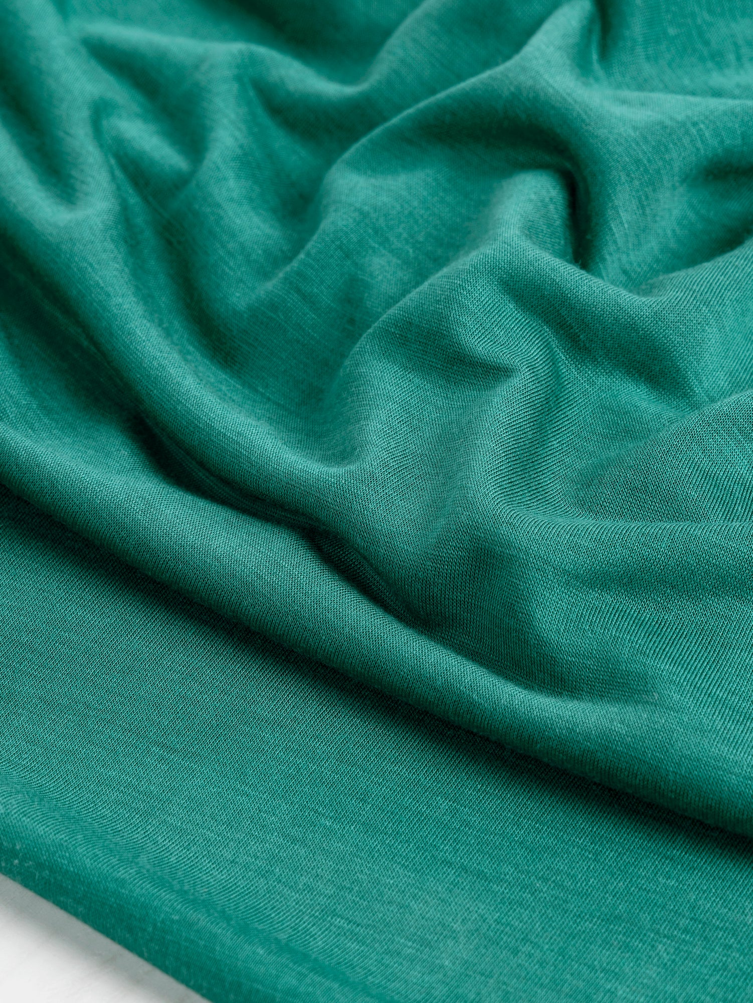 Semi Sheer Viscose Stretch Knit Deadstock - Emerald | Core Fabrics