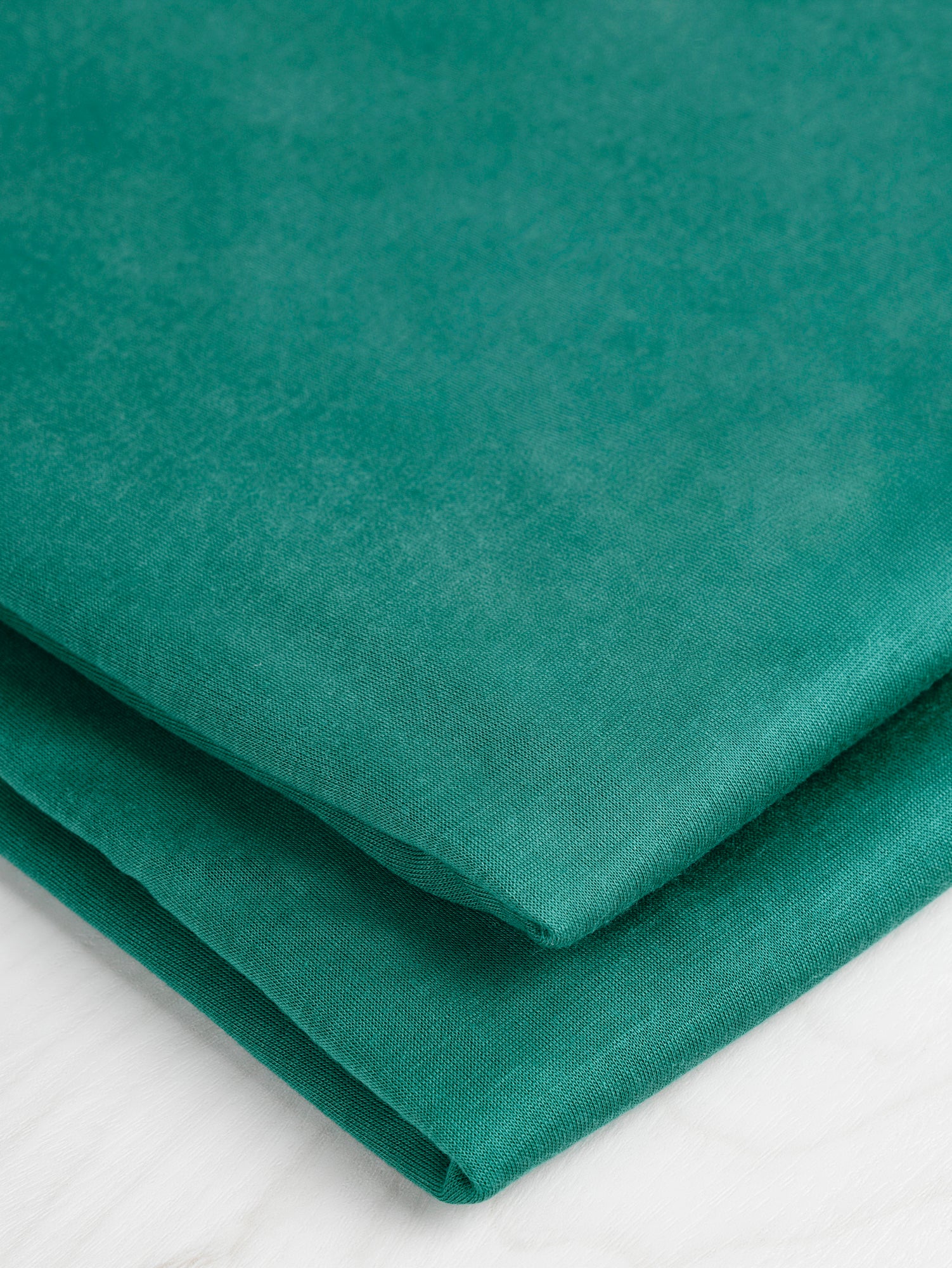 Semi Sheer Viscose Stretch Knit Deadstock - Emerald | Core Fabrics