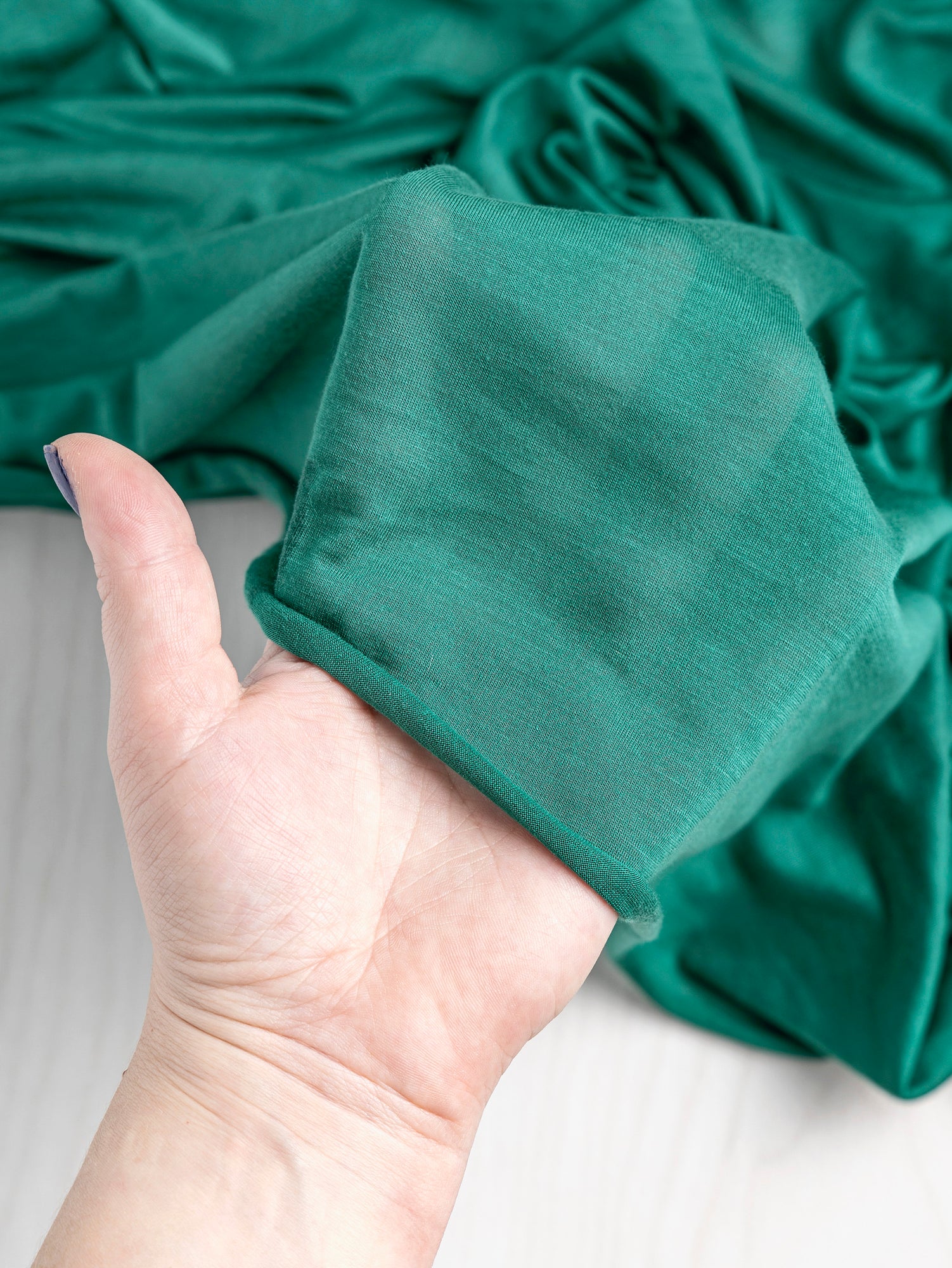 Semi Sheer Viscose Stretch Knit Deadstock - Emerald | Core Fabrics
