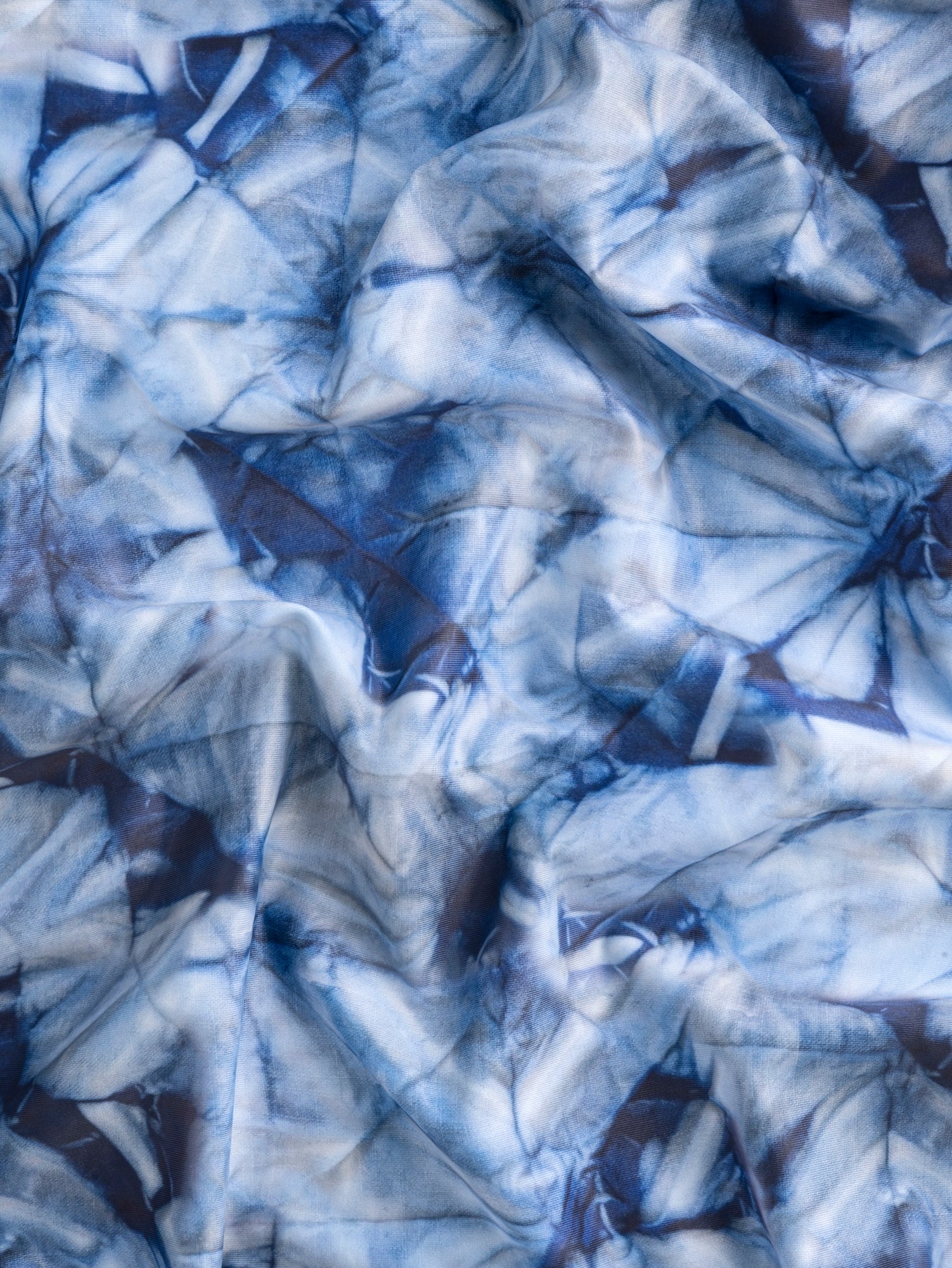 F-DEA135-Shibori-Print-Recycled-Polyester-Knit-Deadstock-Indigo-Core-Fabrics-scrunched.JPG