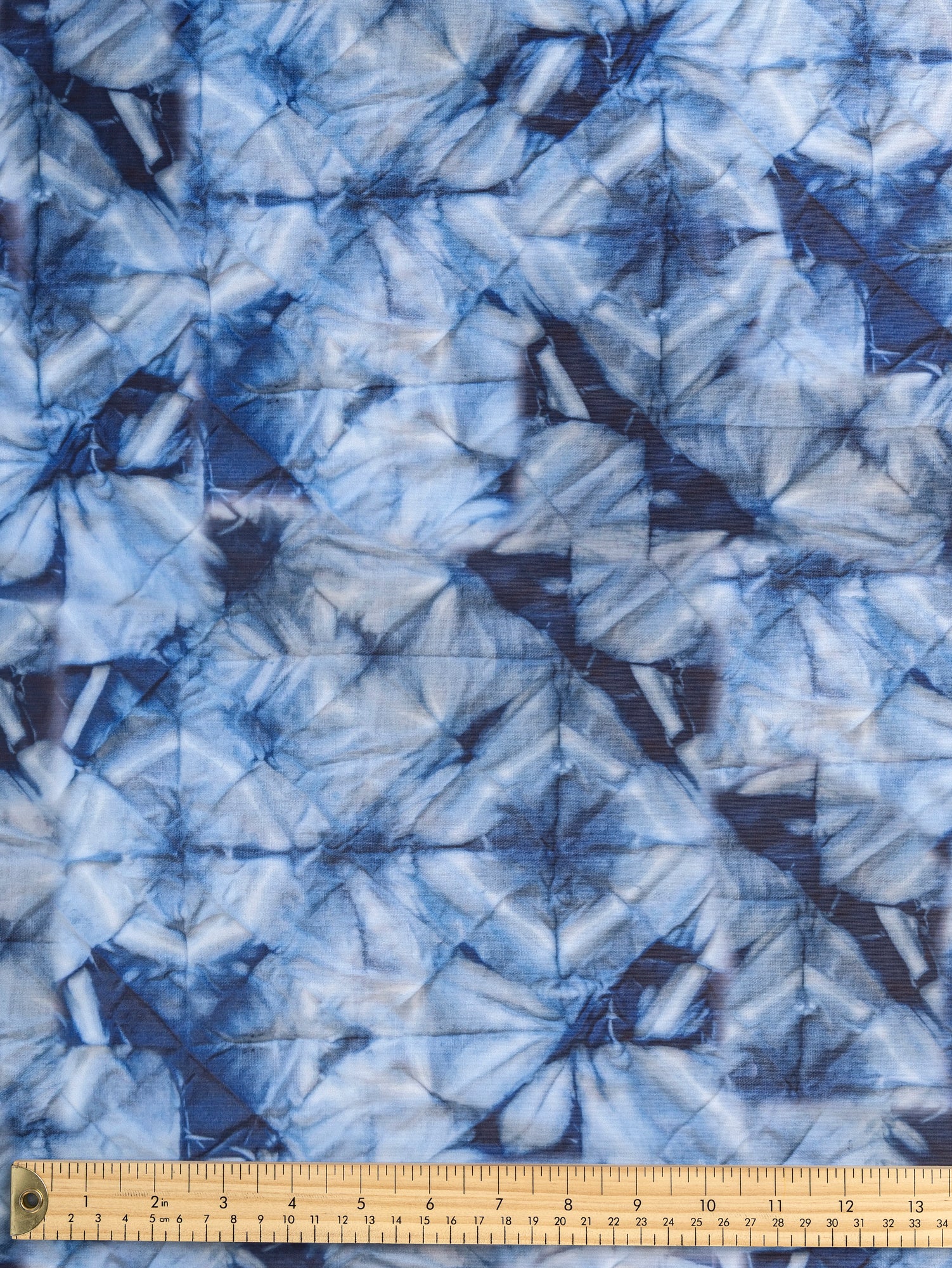 F-DEA135-Shibori-Print-Recycled-Polyester-Knit-Deadstock-Indigo-Core-Fabrics-ruler.JPG