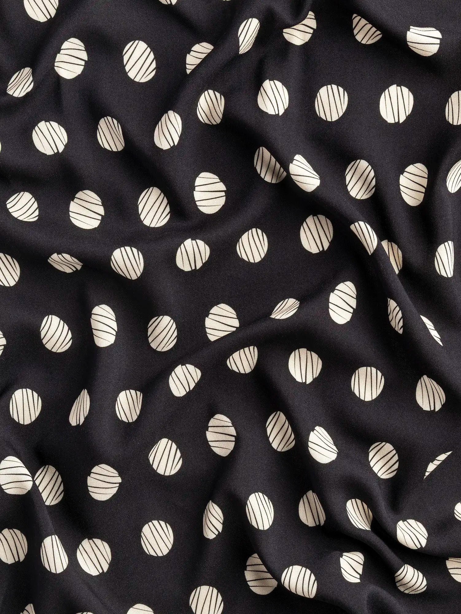 F-VIS299-Sketch-Polka-Dot-Print-EcoveroViscose-Black-and-Oat-Core-Fabrics-scrunched.webp