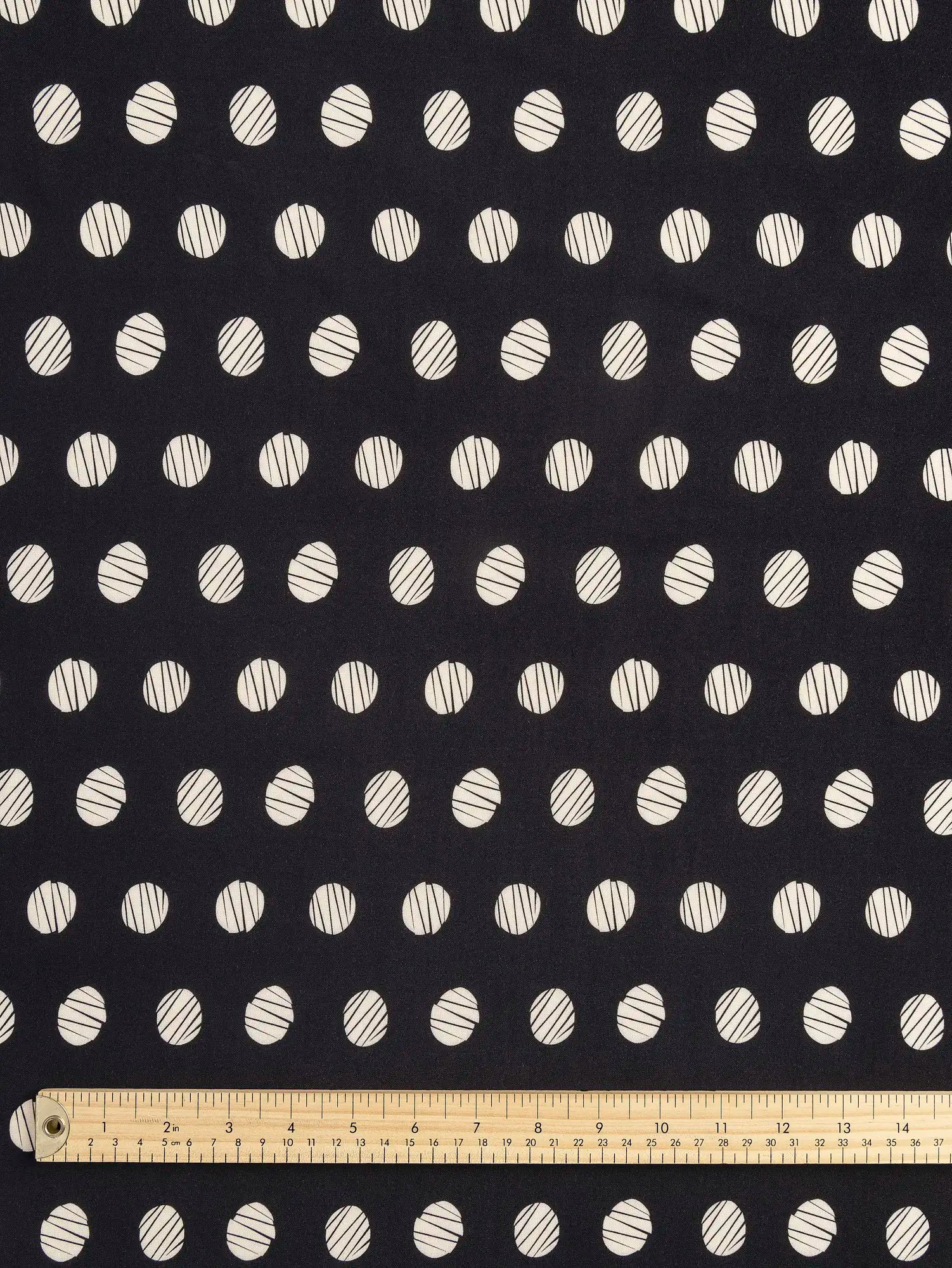 F-VIS299-Sketch-Polka-Dot-Print-EcoveroViscose-Black-and-Oat-Core-Fabrics-ruler.webp