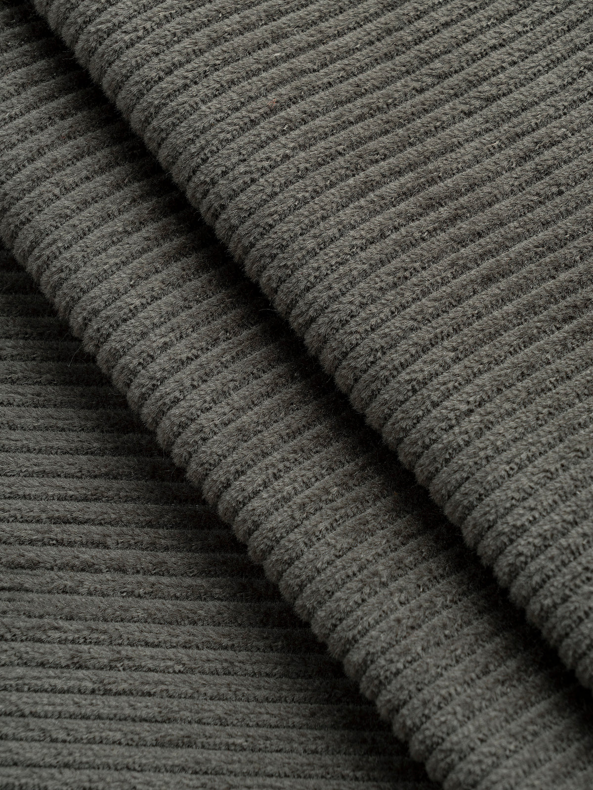 F-COT507-003-Slight-Stretch-8-Wale-Cotton-Corduroy-Olive-Core-Fabrics-fold.webp