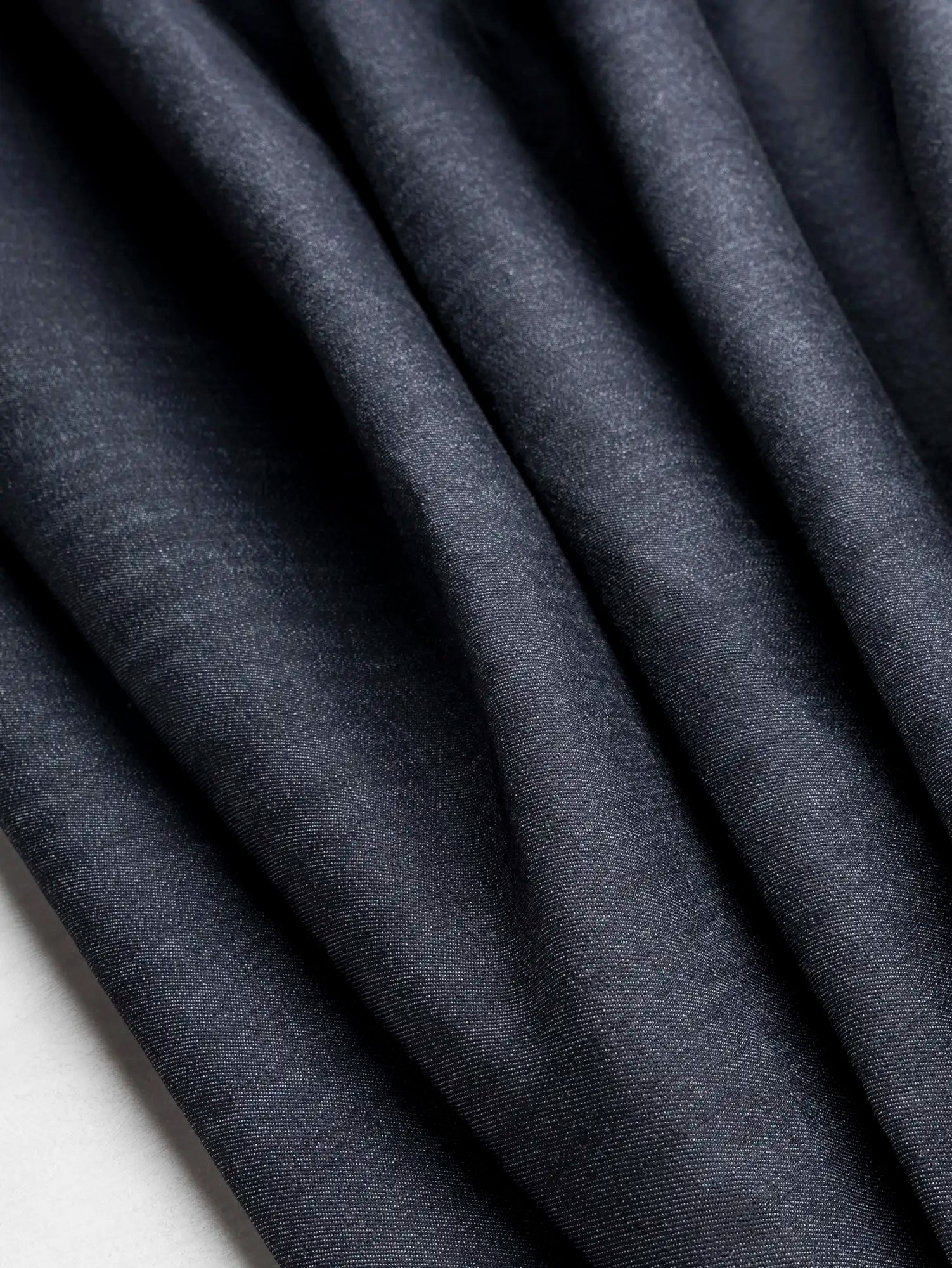 F-DEA245-Slight-Stretch-Cotton-Denim-Deadstock-Dark-Indigo-Core-Fabrics-scrunched.webp