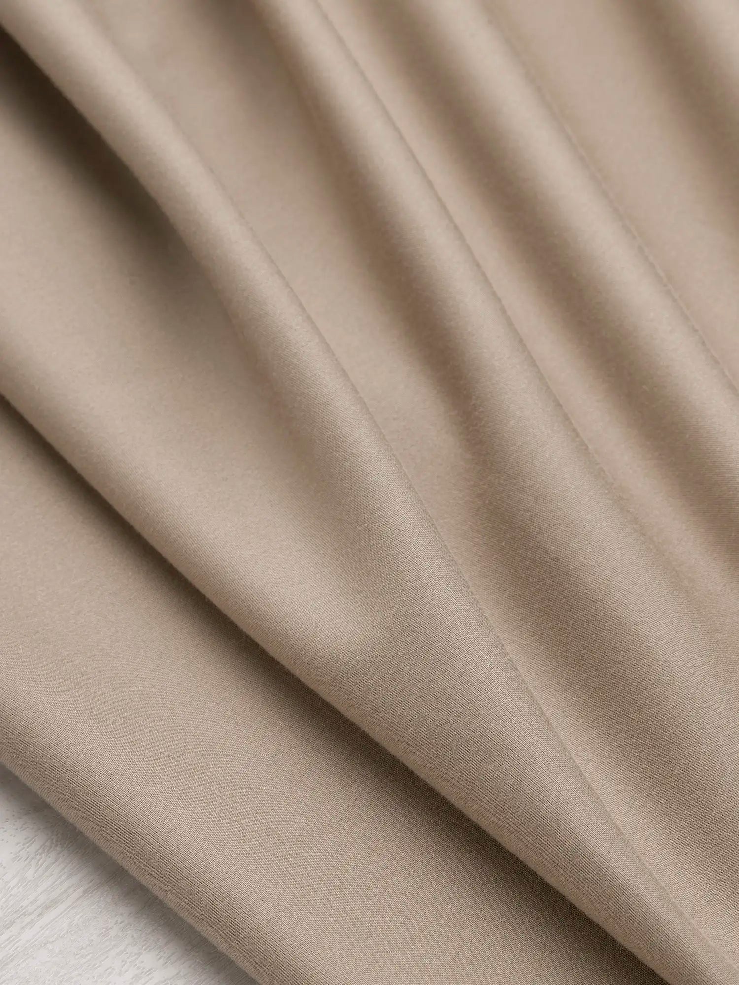 F-DEA175-001-Slight-Stretch-Cotton-Poly-Bottomweight-Deadstock-Sand-Core-Fabrics-scrunched.webp