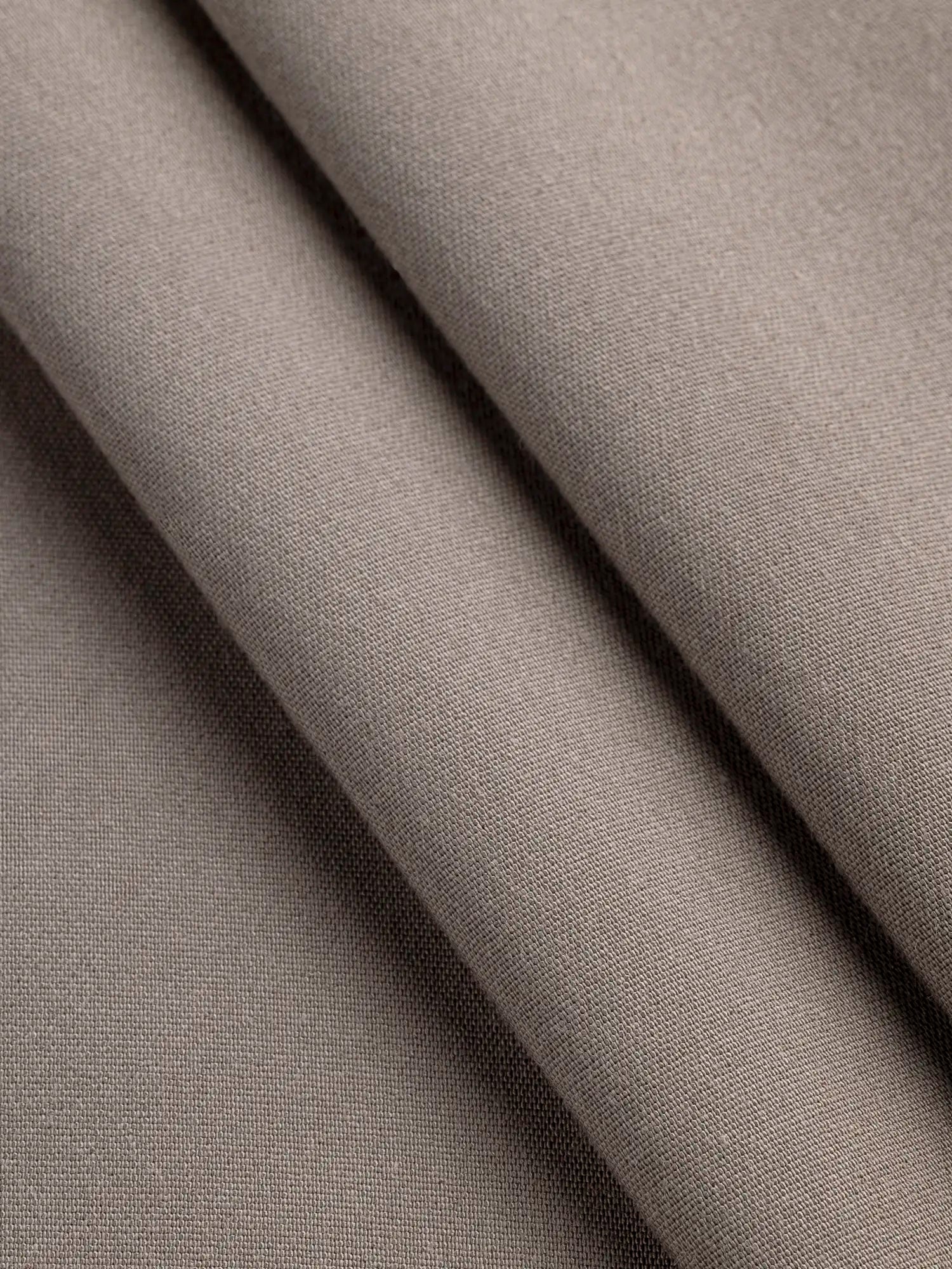 F-DEA175-002-Slight-Stretch-Cotton-Poly-Bottomweight-Deadstock-Taupe-Core-Fabrics-fold.webp