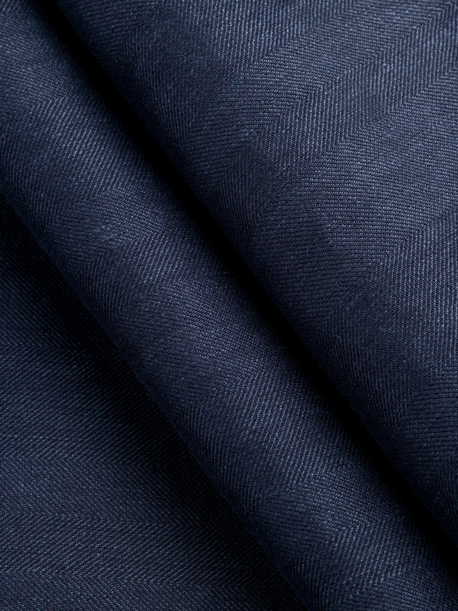 F-DEA172-002-Slight-Stretch-Herringbone-Cotton-Viscose-Suiting-Deadstock-Navy-Core-Fabrics-fold.webp