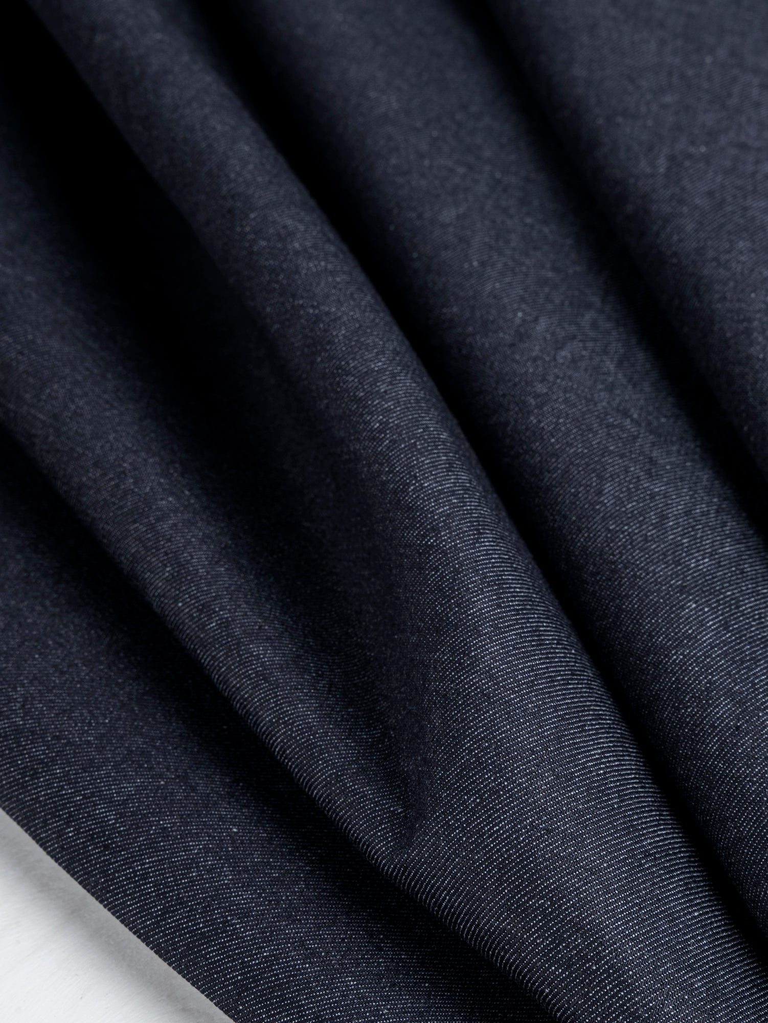 F-DEN035-Slight-Stretch-Midweight-Denim-Deadstock-Dark-Indigo-Core-Fabrics-scrunched.JPG