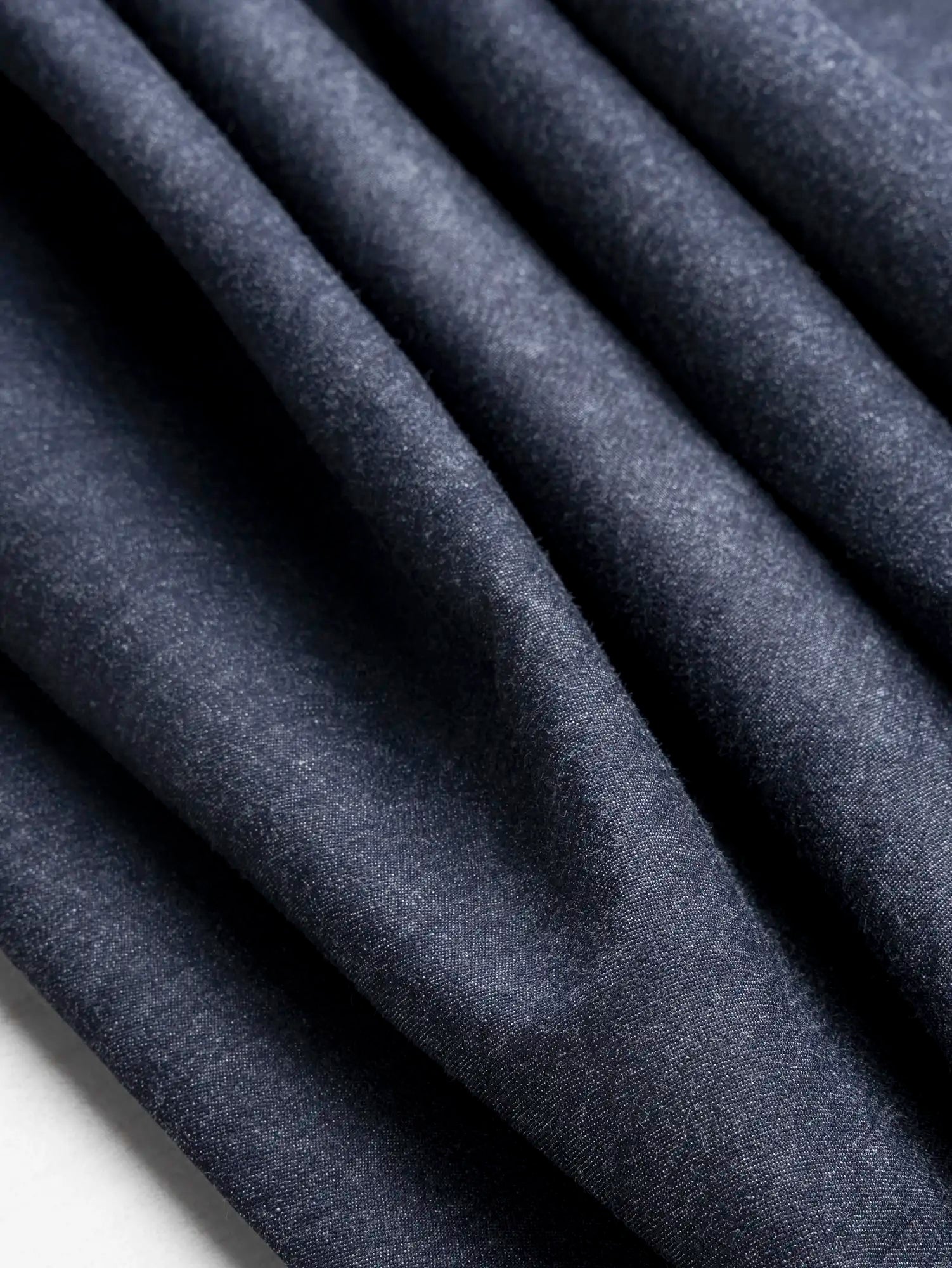 F-DEA244-Slight-Stretch-Ringspun-Cotton-Denim-Deadstock-Indigo-Core-Fabrics-scrunched.webp