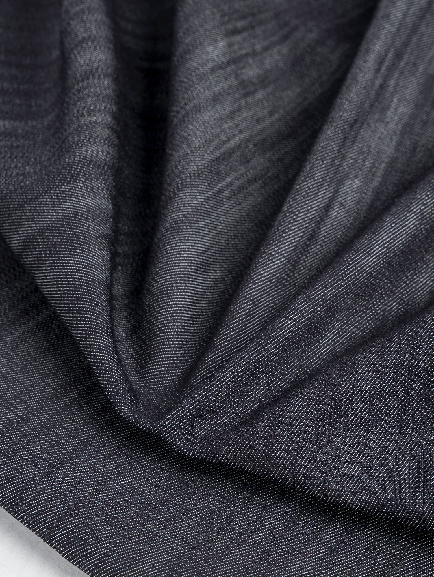F-DEN034-Slight-Stretch-Striated-Midweight-Denim-Deadstock-Dark-Indigo-Core-fabircs-scrunched.JPG