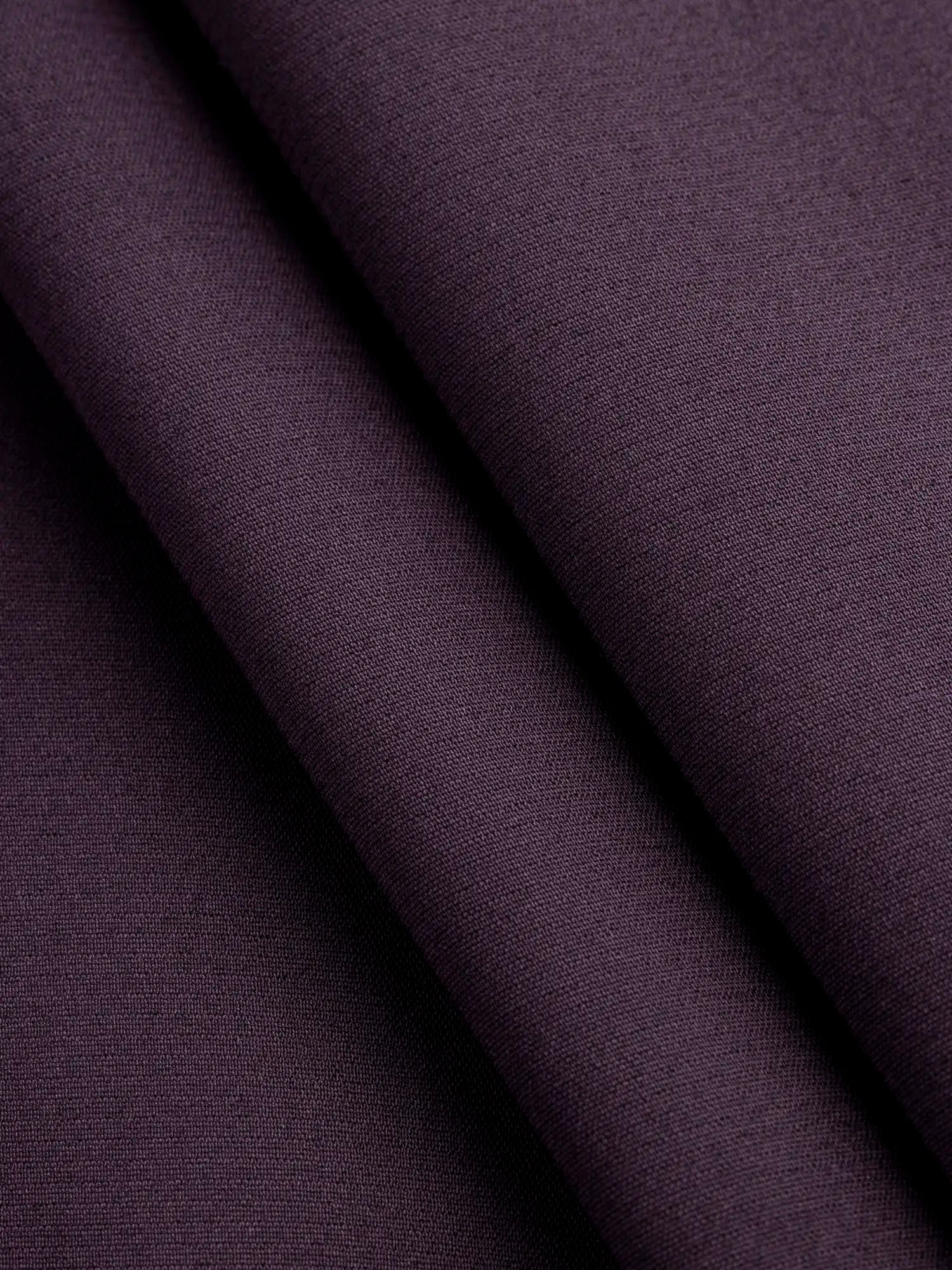 F-DEA174-Slight-Stretch-Viscose-Poly-Bottomweight-Deadstock-Plum-Core-Fabrics-fold.webp