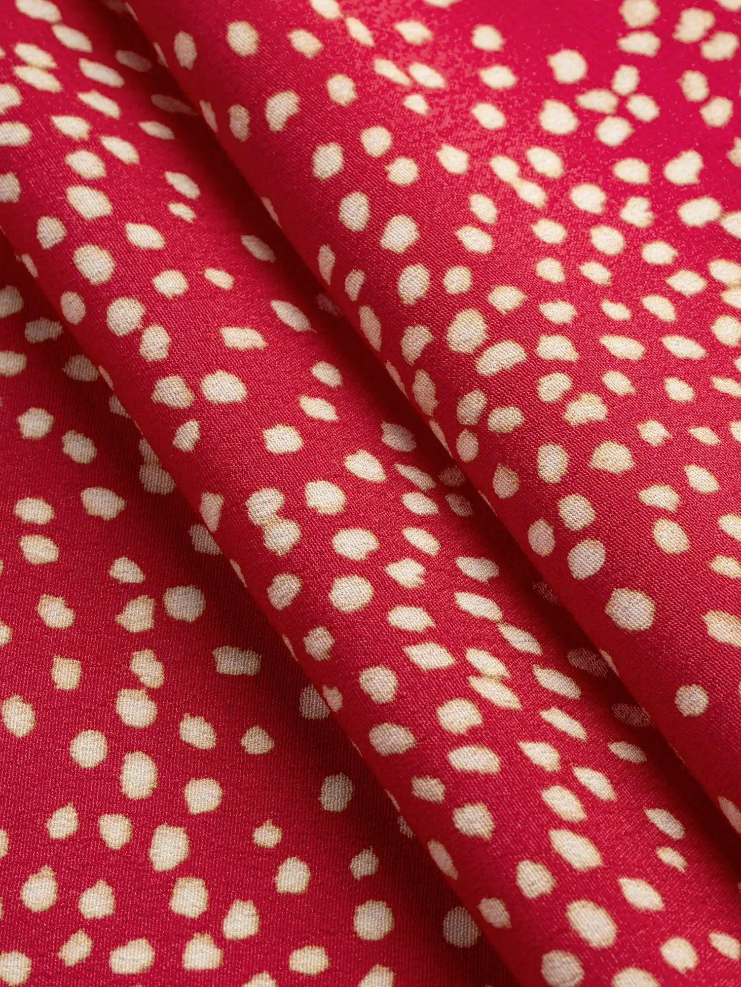 F-VIS293-Small-Dot-Print-Ecovero-Crepe-de-Chine-Scarlet-and-Oat-Core-Fabrics-fold.webp