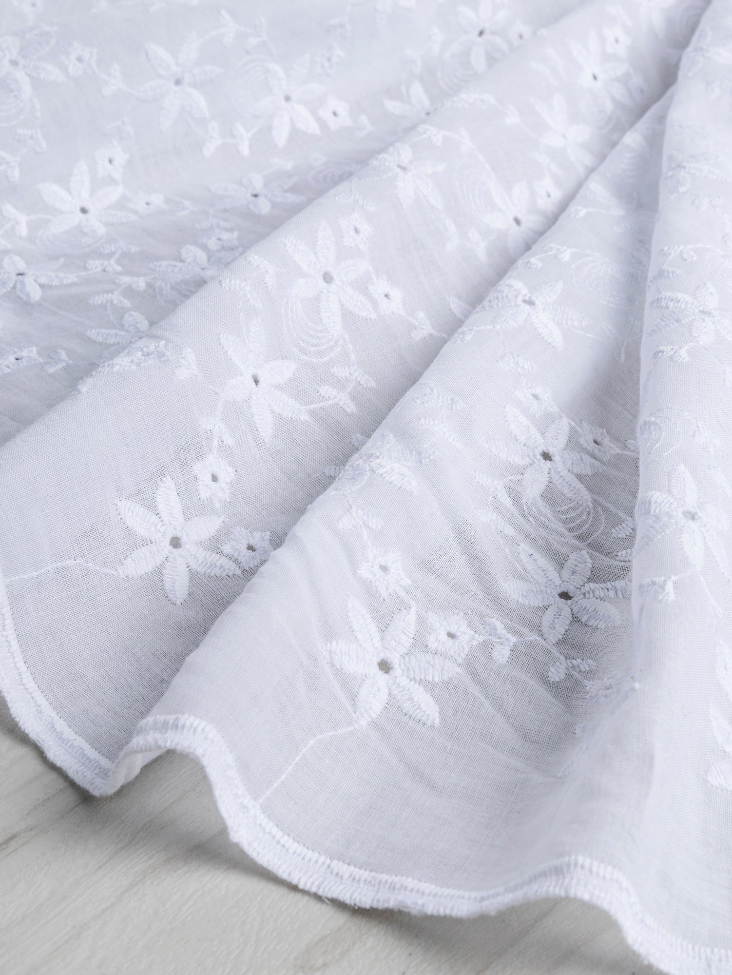 F-COT335-004-Small-Flower-Cotton-Eyelet-Deadstock-White-Core-Fabrics-scrunched