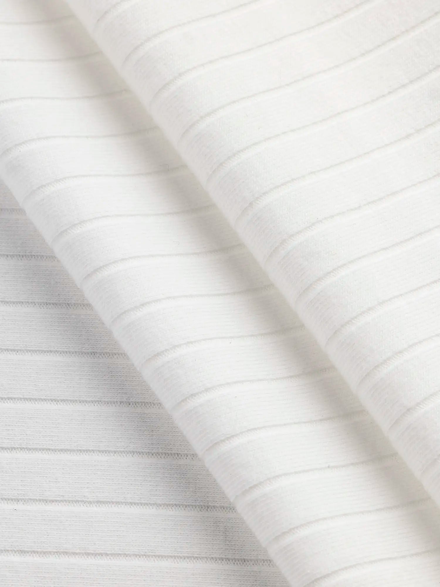 F-DEA179-Soft-Poly-Cotton-Rib-Knit-Deadstock-White-Core-Fabrics-fold.webp