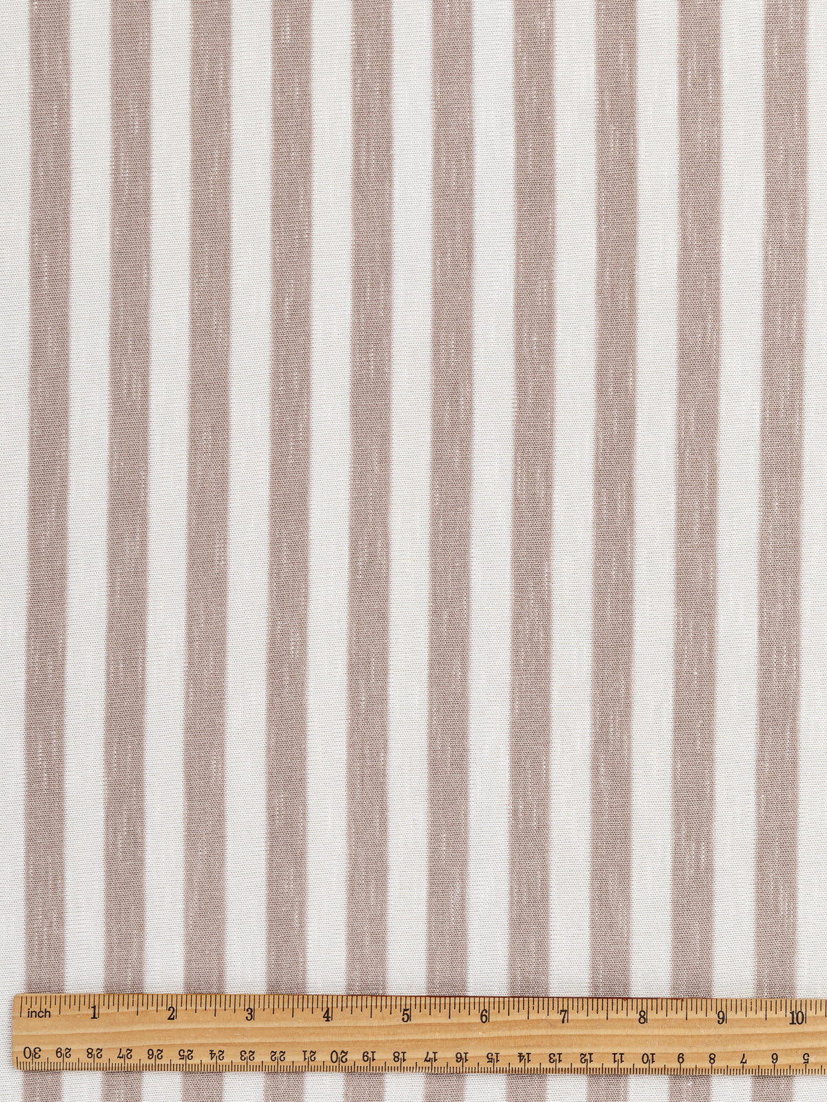 F-DEA019-Soft-Stripe-Viscose-Stretch-Knit-Deadstock-Beige-and-White-Core-Fabrics-ruler.JPG