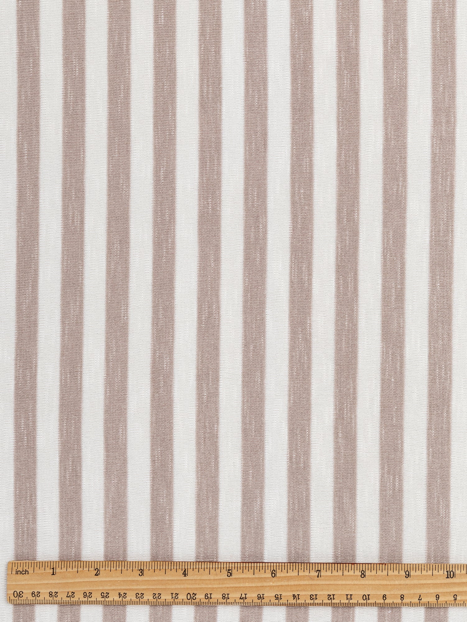 F-DEA019-Soft-Stripe-Viscose-Stretch-Knit-Deadstock-Beige-and-White-Core-Fabrics-ruler.JPG