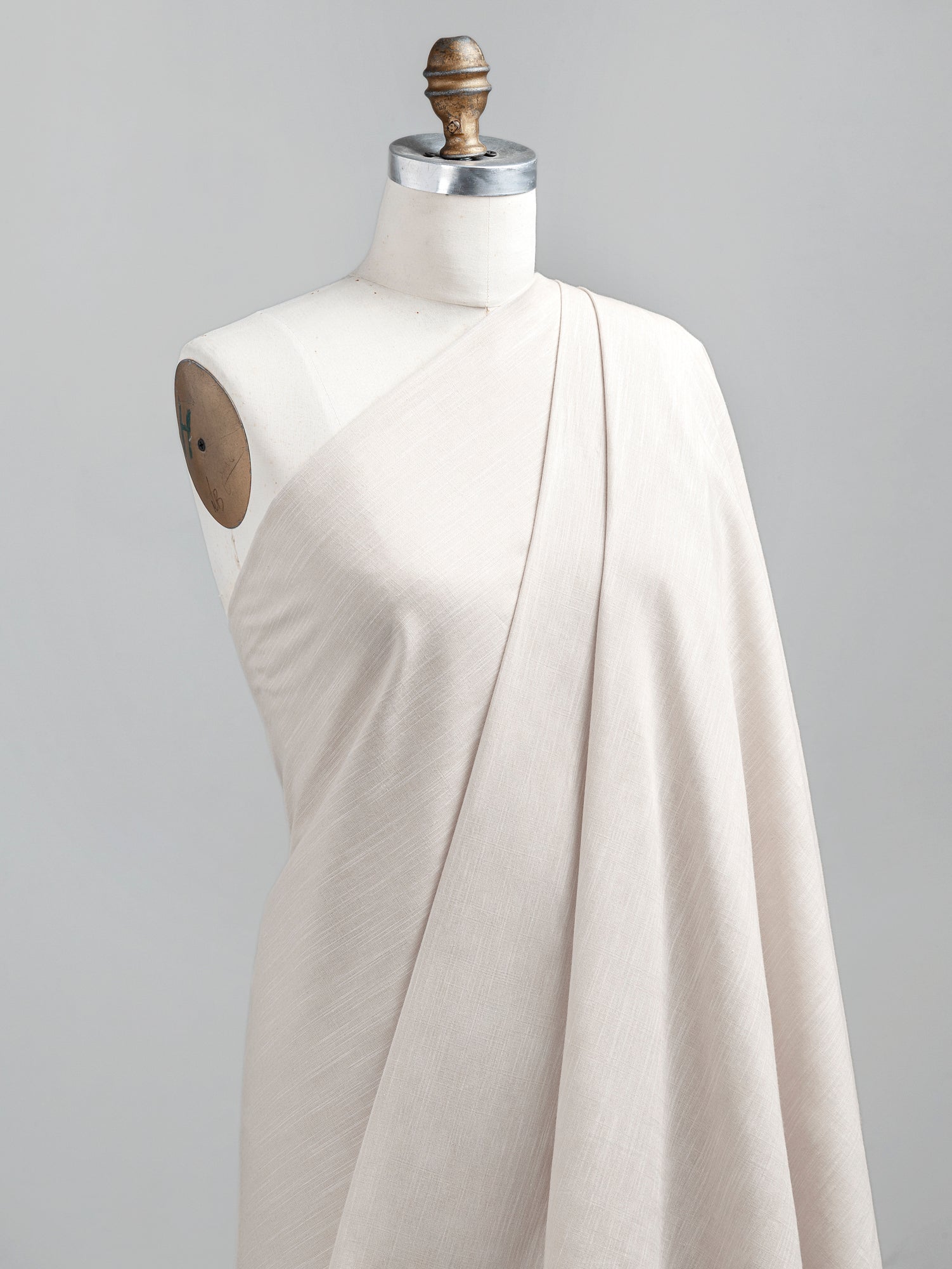 F-COT370-002-Softened-Cotton-Chambray-Shirting-Beige-Core-Fabrics-draped.JPG